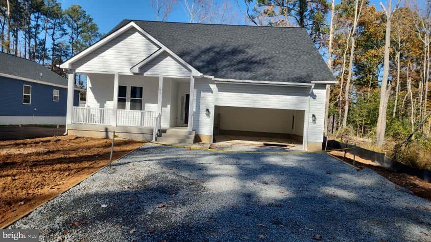 Beautiful BRAND NEW CONSTRUCTION HOME For SALE in the desirable PLACID BAY ESTATES! ESTIMATED completion date mid to end November 2025. Enjoy this 3 BEDROOMS 2 FULL BATHROOMS charming and cozy Craftsman/Ranch Style with 1,539 square feet and TWO car garage. This spacious OPEN - CONCEPT floor plan features a Beautiful KITCHEN with QUARTZ countertops, electric cooking, built-in microwave, white cabinets, Stainless Steel appliances and an island. The FAMILY ROOM is located off kitchen, Luxury Vinyl Plank floors lead throughout the whole main level. PRIMARY BEDROOM has its own FULL BATHROOM with Shower Tub and tiled floors, Quartz Double Vanity Tops and a big WALK-IN CLOSET. The other TWO BEDROOMS share a centrally located FULL BATH ideal for guests or family members that features a Quartz Vanity Top, Soaking Tub and Tile Floors. Laundry Room is located off garage. Plenty of parking in this large 2 car garage (approx.479 sqft) and on the gravel driveway. The backyard features a  spacious 16 x 12 DECK, perfect for outdoor entertaining or relaxing. Placid Bay Estates has a voluntary HOA, dues are applied to maintenance and improvement to common areas of the subdivision, such as Community Center, Dams, Docks and Boat Ramp. Access to Potomac River via Mattox Creek with beautiful wildlife and recreation area. Approximately 6 miles to the Town of Colonial Beach, 30 minutes to Dahlgren, 35 minutes to Bowling Green/A.P. Hill, and around 45 minutes drive to Fredericksburg, easy access to Maryland via Harry Nice Bridge. Schedule your appointment today!