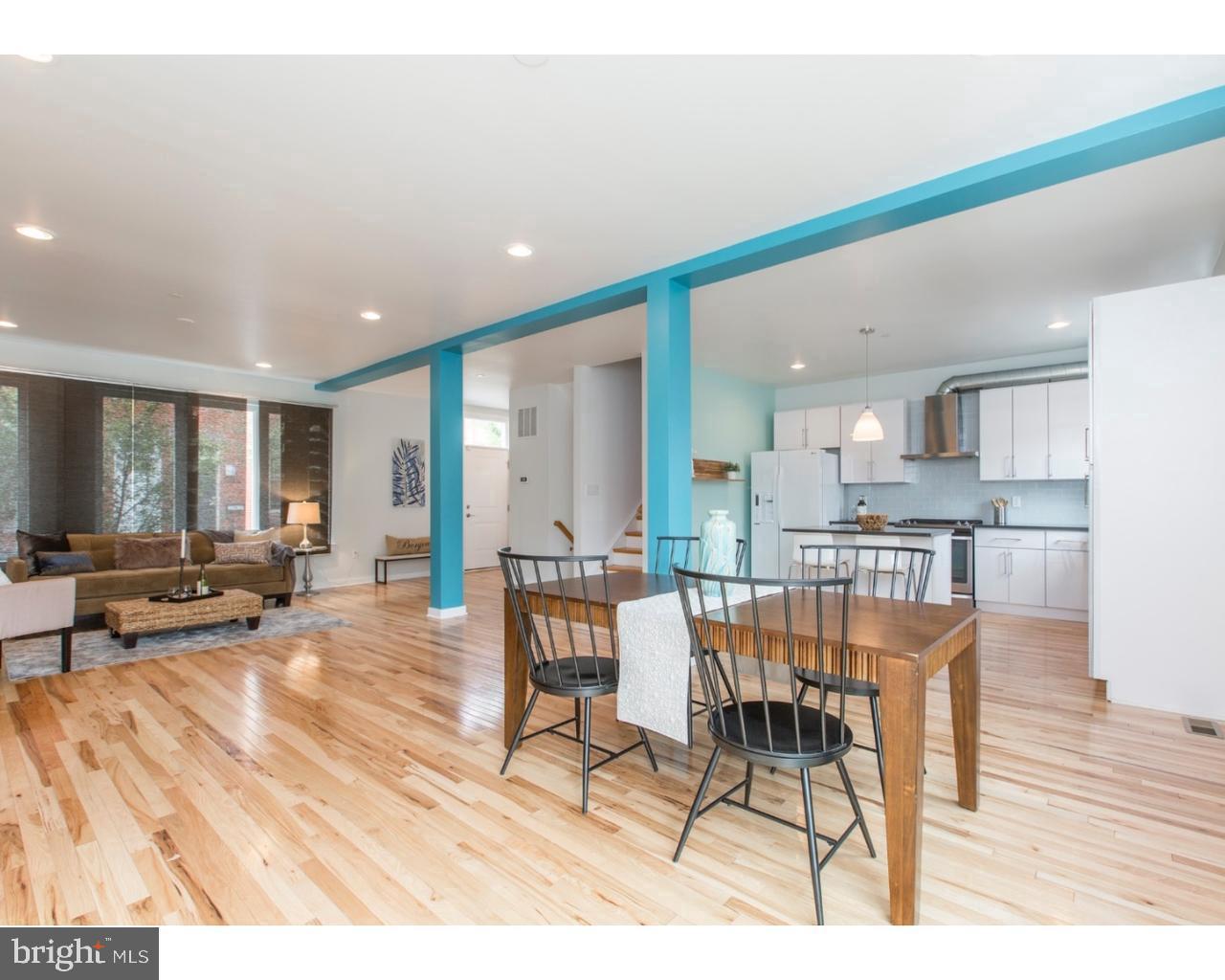 Rare 30' double wide 4 bedroom - 3 1/2 bathrooms in the heart of the bustling Brewerytown neighborhood is now available for June 1st. Enter through an open and bright first floor with Southern exposure, featuring Hickory hardwood floors and high hat lightening throughout. Chef's kitchen includes ample quartz countertops & cabinet space. From your dining room area, step outside to your private patio spanning the length of the property line. The 2nd floor features 3 great size bedrooms, washer dryer area and full hallway bathroom. There is also an en suite bathroom in one of the bedrooms. 3rd floor is your primary suite with dual walk-in closets, dual vanity master bathroom and stall shower. Kitchenette area as you head up to the roof deck with amazing views. This home also includes dual zoned heating & cooling and Fios. Easy access to all public transportation.