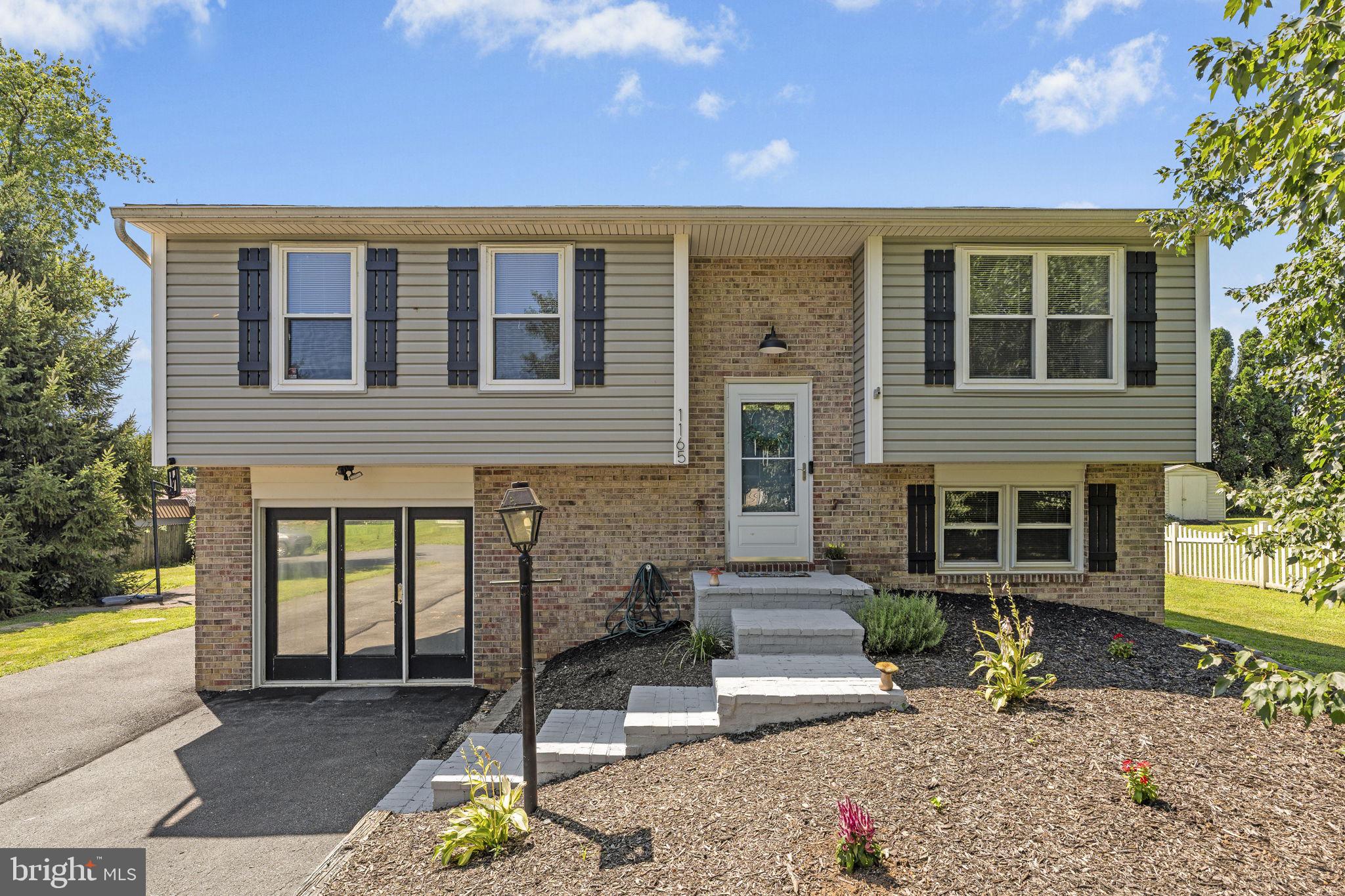 This charming, 3 (possible 4) bedroom bi-level located in the peaceful countryside of Mount Joy boasts new LVP floors, updated finishes, a new 2 car garage and patio, and a cozy, fenced-in backyard with scenic views overlooking a flower farm that is on preserved farmland. The finished lower level includes a Family Room, 1/2 bath, Laundry Room and potential 4th bedroom, office, or fitness room. The new, 24' x 26', detached garage, built in 2023, has space to park 2+ cars. Along with an additional shed, the garage also offers significant storage space. The large, fenced-in backyard, overlooked by a deck and patio, offers so many possibilities for playing, relaxing, and entertaining.