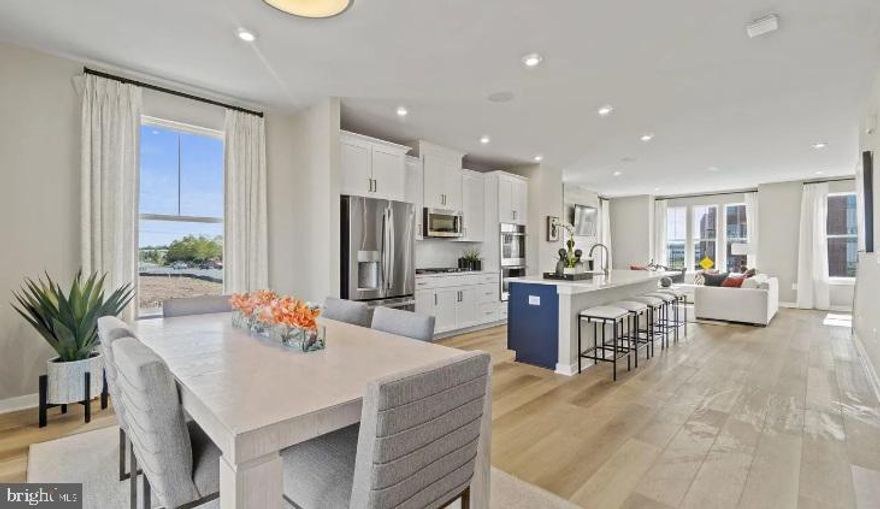 Luxurious 4-Level Townhome for Lease in Arcola - Fully Furnished!  The home is perfect for families being transferred to the area, a corporate rental, or for traveling professionals who want more privacy and comfort than hotel rooms offer.

Experience unparalleled luxury living in this brand-new former model townhome located in the highly sought-after neighborhood of Arcola. This beautifully furnished home boasts 3 spacious bedrooms and 4 modern bathrooms, offering the perfect blend of comfort and style across four stunning levels.

The main floor features an open-concept living area with a cozy fireplace, perfect for both relaxation and entertaining. Enjoy the fresh air on your private deck, ideal for morning coffee or evening cocktails. The rooftop deck offers a large outdoor retreat with breathtaking views, perfect for hosting gatherings or simply unwinding after a long day.

Other key features include a 2-car garage, ample storage, and easy access to nearby amenities. Residents can take advantage of the outstanding Loudoun County school district, ensuring excellent educational opportunities. Located just a 5-minute drive from the Ashburn Metro, commuting is a breeze!

This townhome is ideally situated near local breweries, restaurants, and shops, offering a wealth of options for dining, entertainment, and shopping. Additionally, enjoy exclusive access to community amenities such as a spacious clubhouse, meeting rooms, patios, and an outdoor pool for year-round enjoyment.

Don’t miss out on this exceptional leasing opportunity! Experience luxury living in a prime location – schedule your tour today!