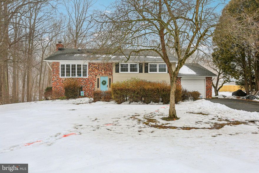 This 3BR, 3BA home is move-in ready and on a breathtaking .9-acre lot!  The bright living room with bay window boasts wide-plank laminate flooring and opens to the dining room. The spacious kitchen with tile floor and backsplash, pantry, recessed lights and exit to the deck. Move in just in time to enjoy the outdoors in your huge screened-in deck—perfect for unwinding as well entertaining! This space will surely become your happy place!
The primary en-suite includes a custom closet and an updated bath boasting a glass-door, walk-in shower with subway tile. Two generously sized bedrooms and updated hall bath with granite vanity and tub/shower combo with glass doors complete the main level. Ceiling fans in all bedrooms! 
Large family room in the finished lower level is a showstopper with LVP flooring, a brick accent wall, recessed lights and a thermostatically controlled pellet stove insert for incredible utility savings. A back door continues the living space outdoors to the patio with a brick surround. The lower level also features a recent full bath and a flex room (potential 4th bedroom). The utility/storage room houses the laundry area complete with washer and dryer. Plenty of storage space as well as access to the attached garage. 
Never worry about power outages with the automatic whole-house generator (powers HVAC, well pump, fridge, and more). One Year Home Warranty! Conveniently located in Forest Hill close to Jarrettsville for easy commutes to Northern Balto Co. And bordering Fallston to access I95. Welcome Home!!