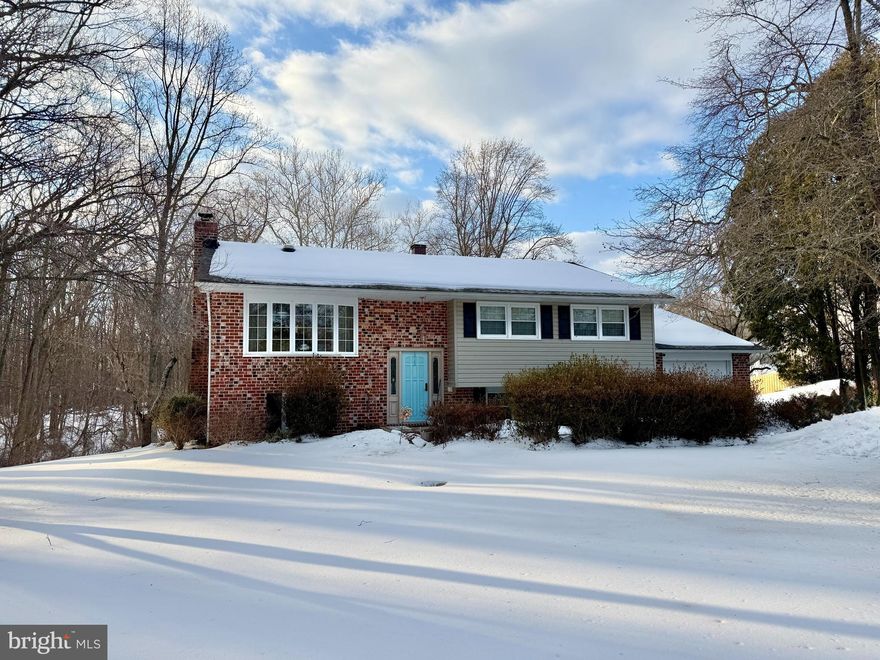This 3BR, 3BA home is move-in ready and on a breathtaking .9-acre lot!  The bright living room with bay window boasts wide-plank laminate flooring and opens to the dining room. The spacious kitchen with tile floor and backsplash, pantry, recessed lights and exit to the deck. Move in just in time to enjoy the outdoors in your huge screened-in deck—perfect for unwinding as well entertaining! This space will surely become your happy place!
The primary en-suite includes a custom closet and an updated bath boasting a glass-door, walk-in shower with subway tile. Two generously sized bedrooms and updated hall bath with granite vanity and tub/shower combo with glass doors complete the main level. Ceiling fans in all bedrooms! 
Large family room in the finished lower level is a showstopper with LVP flooring, a brick accent wall, recessed lights and a thermostatically controlled pellet stove insert for incredible utility savings. A back door continues the living space outdoors to the patio with a brick surround. The lower level also features a recent full bath and a flex room (potential 4th bedroom). The utility/storage room houses the laundry area complete with washer and dryer. Plenty of storage space as well as access to the attached garage. 
Never worry about power outages with the automatic whole-house generator (powers HVAC, well pump, fridge, and more). One Year Home Warranty! Conveniently located in Forest Hill close to Jarrettsville for easy commutes to Northern Balto Co. And bordering Fallston to access I95. Welcome Home!!