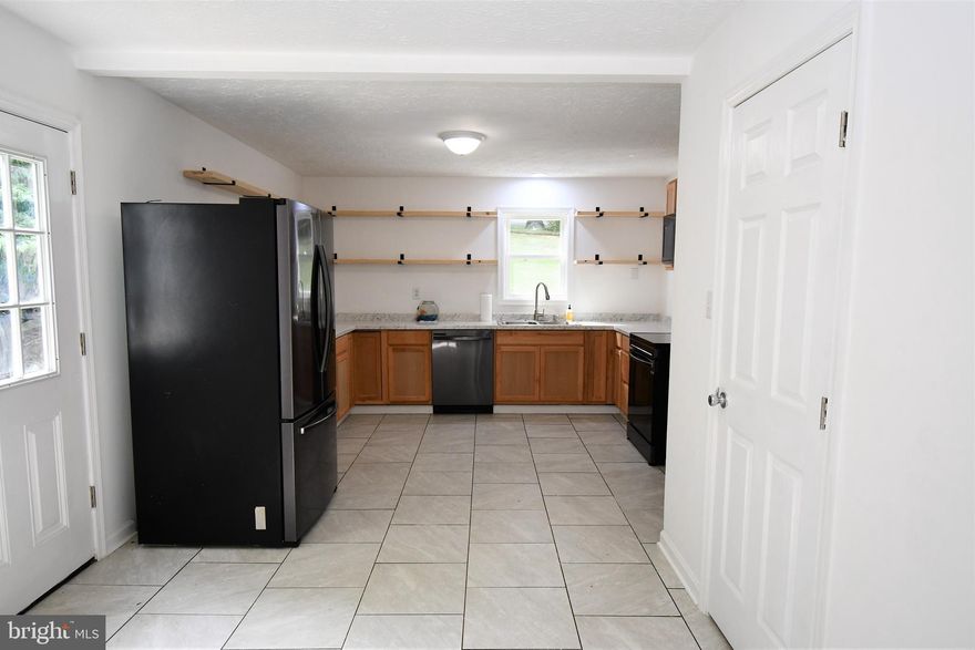 Through the Journey Home Program Qualified buyers can receive a  $ 10,000. grant for closing cost.  See flyer attached to documents.  This renovated 2 beds 2 bath ranch home has  new roof, new siding , new windows, new hvac, new upstairs bathroom, and new kitchen.  Hardwood floors have been redone and all the  inside freshly painted.  The basement is unfinished but has a finished full bath.