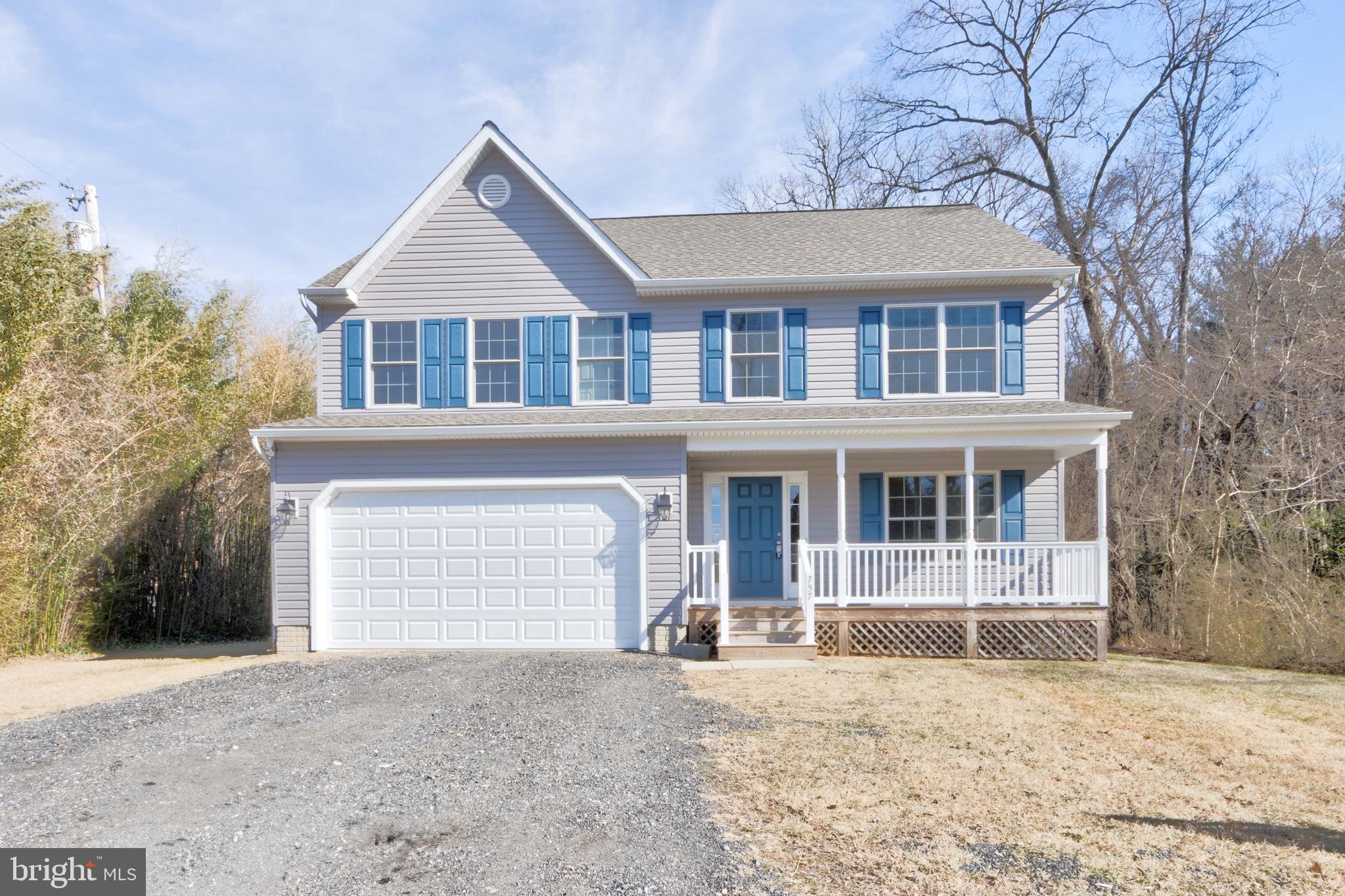 Wow don't miss this great home with a convenient location in sought after Severn Run High School district. This spacious home has just been freshened up with new paint and carpet, the hardwood floors have been done. There is a welcoming front porch and a giant deck in the back with plenty of room for kids and dogs to run. Inside this home features hardwood floors, granite counters black front appliances, oak cabinets with an open floor plan. The lower level has a mini kitchen, a full bath and could be an in-law suite or just a getaway space. The upper level has 4 spacious bedrooms including a master suite with walk-in closets, a huge bath area with an air jetted tub. The hall bath is also ceramic, and the bedrooms have new carpet as well. There is also a transfer switch for a generator. Don't miss this great home.