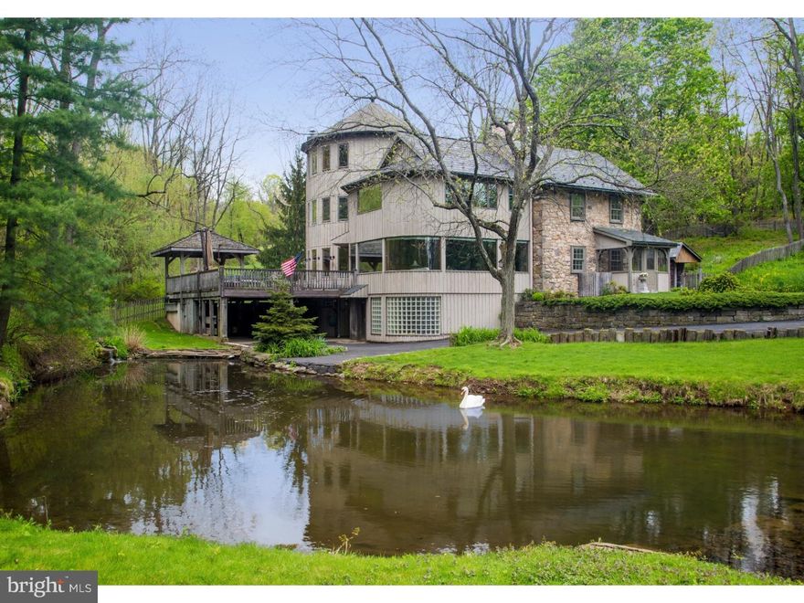 Silohouse is a very special property, imagined, designed and executed by each owner, augmenting a 1732 heritage with enhancements beyond compare. Bursting with blooms, 11 acres envelops an early stone colonial and adapted silo addition, pond and barn.  Silohouse is one of the finest properties ever offered in Lehigh County. The property underwent years of renovation to create a magnificent metamorphosis.  Walls of windows bring gardens and ponds into the main living spaces. A welcoming, cobblestone courtyard, with imported Brazilian granite blocks, bespeaks the charms of exquisite European villages. By entrance at the end of a cul-de-sac, traversing thick green lawns, waterfall and ponds, you arrive to breathtaking acreage, cultivated with complete privacy in mind.   The beauty, throughout, is in the recaptured stone walls, random width wood and slate floors with radiant heat, exposed beamed ceilings, mechanicals boasting over 25 zones of heating and a generator? all of the finest construction. The original home has a cathedral ceiling and walk-in fireplace. A sunroom offers walls of glass, slate floors, and cherry built-ins and is the ideal place to spend a lazy afternoon.  A kitchen, with custom cabinetry, the finest appliances, bentwood counters, and breakfast area, is bathed in light. On the opposite end of the home is the new and luxurious master suite, with a spa-like, sumptuous master bath, augmented by a fireplace, custom closets and details to take your breath away.  4 more bedrooms, an office and 2 full & 2 half baths are composed of select stone, tile and custom fixtures.  Silohouse is an extremely versatile property and perfect gentleman's estate. A recent building offers a 4-6 car garage, office and lofted storage.  This is a property that rarely comes on the market and, when it does, it raises the bar for all the others.