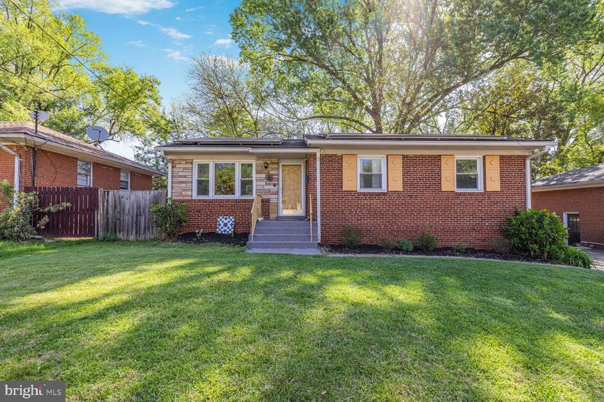 Beautiful 3-bed, 1.5-bath brick rambler in the desirable Wheaton Woods neighborhood. Hardwood floors flow through a bright and spacious family room that opens to the dining area, ideal for everyday living and entertaining. The well-appointed kitchen offers ample counter and cabinet space, a cooktop, wall oven, and direct access to the rear deck. Three comfortably sized bedrooms share a full bath with a tub/shower combo, making single-level living both convenient and functional. The partially finished lower level with powder room and laundry area adds approximately 1200 sq ft of versatile space. Whether you envision a rec room, in-home office, gym, or additional storage, the possibilities are endless. Outside, your backyard retreat awaits. The fully fenced yard with “low-maintenance” composite deck is framed by mature trees. Paved driveway offers off-street parking with plenty of street parking right in front of the home. You’ll love the leased solar panels providing reliable green energy year-round, plus no HOA fee! Ideally located near Twinbrook and Glenmont Metro (red lines) and major commuter routes. Pike & Rose and Rockville Town Square are just a short drive away offering an abundance of shopping, dining, and entertainment. This is one you won’t want to miss!