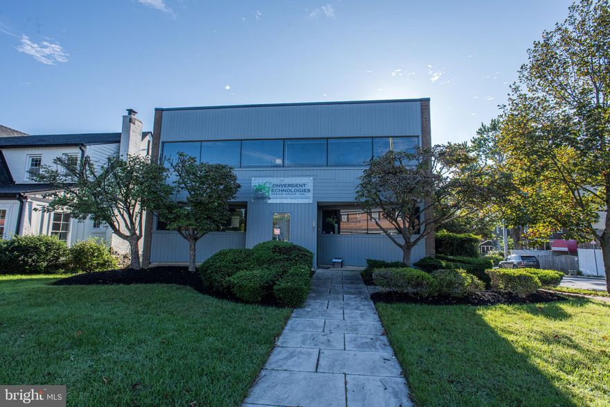 This standalone  2-Story Office Building  with finished ground level provides 3900 SF of prime office space. This highly visible building facing York Rd sits on a  .43 acre corner lot with easy access to central Towson and a variety of restaurants & retail amenities, all in walking distance.   The property features  a newly resurfaced parking lot (2025) with 10+ surface parking spaces, 2-levels of executive offices with large windows, kitchen,  conference room w/ multiple meeting spaces, and  office space in the lower-level. This is also an additional 250 SF exterior storage unit. The interior of the building was professionally designed with a color palette that promotes creativity in a vibrant and energetic work environment. The exterior of the building was recently painted and landscaped in 2025. Your new building has 2 prominent building signage locations to help promote your business along the York Road corridor.  The proximity to Towson University, GBMC, St Joseph Hospital, Downtown and the Beltway provides convenient access to and from the office.