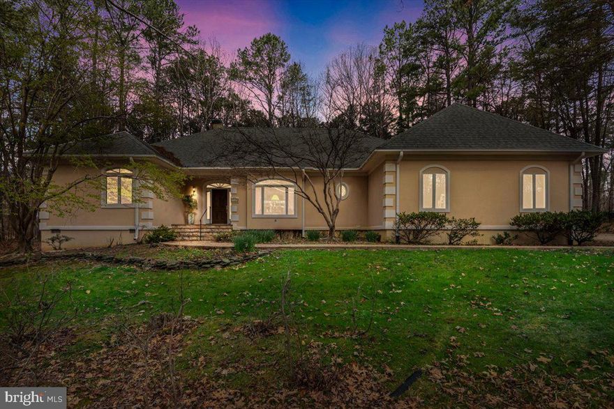 Beautiful, large rambler in the highly sought after Fawn Lake Community!!  This property backs up to the 18th hole of the award winning Fawn Lake Golf Course!!!  Mature trees and landscaping provide both privacy and scenic views of the fairway!  This well-maintained home has a beautiful stamped concrete driveway that leads to an oversized, side-loading 2 car garage.  Large open-concept kitchen and family room ready for your design!  Huge master bedroom and bathroom with private entrance to screened in porch and deck.  Master bedroom is located on separate wing of the home to offer privacy.  This home features two other large bedrooms and formal living room that would be perfect for an office.  The The oversized family room has floor to ceiling windows and glass doors that offer beautiful natural light.  Entire house was recently power washed.  Gas Fireplace and irrigation system convey as-is.