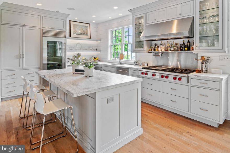 We are pleased to extend a very warm welcome to #4 Overlea Way, a desirable end unit in a private, gated enclave of 13 custom town homes, in one of the area's most desirable locations. Beautifully sited on 1.67 mature landscaped acres just a short walk to the Morris Arboretum. Overlea offers a turnkey, low-maintenance lifestyle, with all the amenities and conveniences today's buyer demands. The finest new construction you have come to expect from Blake Development, one of Philadelphia's premier custom builders. Offering 3500 square feet, enter a gracious foyer, library with custom built-ins, wine closet and powder room. Next level offers an ideal floor plan designed for every day living and entertaining. Formal living room with wood burning fireplace, dining area, and a gourmet kitchen that you dream about. Features include Wolf Cooktop and oven, SubZero refrigerator, 2 additional under counter refrigerator drawers, 2 dishwashers and beverage center. Custom cabinetry, millwork and marble countertops complete the picture. Third and fourth floors include master bedroom suite with well-appointed bathroom and generous walk-in closet. Two additional bedrooms, two full baths. The fourth bedroom has been thoughtfully designed as a bunk room, ready to accommodate the kids next sleepover. Laundry conveniently located on the third floor with ample closet space/storage. Just three years "new" this unit is LOADED with upgrades including high-performing stereo sound and video, Hunter Douglas window treatments, white oak hardwood floors and custom built-in cabinetry throughout. Elevator servicing all four floors and a two car garage. Outdoors offers a flagstone terrace and covered balcony, perfect for entertaining. Enjoy a premium location, just minutes to Chestnut Hill, Erdenheim Farm and an easy commute to Center City and the Main Line.