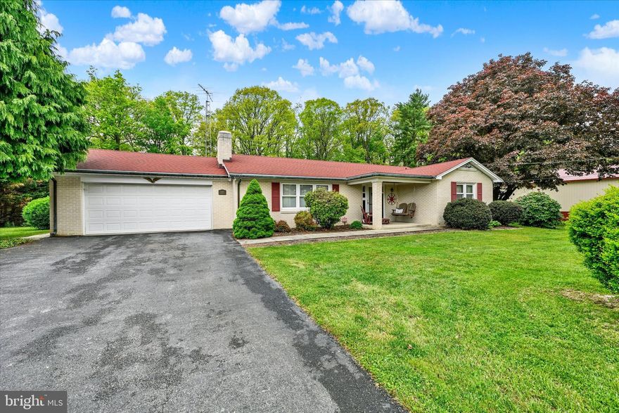 Welcome to 1609 Fairmount Ave—a property that offers so much more than just a place to call home. Nestled on a serene 1.59 acre lot in a quiet Hampstead neighborhood, this meticulously maintained rancher delivers modern updates, effortless charm, and one standout feature you won’t want to miss.

Let’s talk about the showstopper: the 40x60 Pioneer Pole Building. Built in 2017, this extraordinary structure is a dream come true for car enthusiasts, mechanics, or anyone who needs serious workspace or storage. It features a massive 14x14 raised panel door with a LiftMaster opener, a reinforced 6-inch concrete floor, 100-amp sub-panel electric service, and a 50-amp RV receptacle. And here’s the kicker—the lift in the pole building conveys! Whether you’re restoring classic cars, working on custom builds, or simply tinkering with your collection, this space is ready to fuel your passion.

But that’s not all the property has to offer. With a 2-car attached garage and an additional 2-car detached garage, there’s no shortage of space for your vehicles, tools, or hobbies.

The home itself is just as impressive, with thoughtful updates that make life both stylish and convenient. The kitchen shines with Cambria Quartz countertops, a ceramic tile backsplash, and high-end stainless steel appliances from LG and KitchenAid. Major systems have been upgraded too, with a new roof in 2015, a 200-amp electric service, and all plumbing updated in 2017. Outside, the backyard patio and hot tub area is enclosed by a sleek black aluminum fence. Perfect for pets or added privacy.

This property is the complete package: a comfortable home, a private setting, and a fully equipped pole building that’s ready to support your passions or profession. Don’t wait—schedule your showing and see it for yourself!