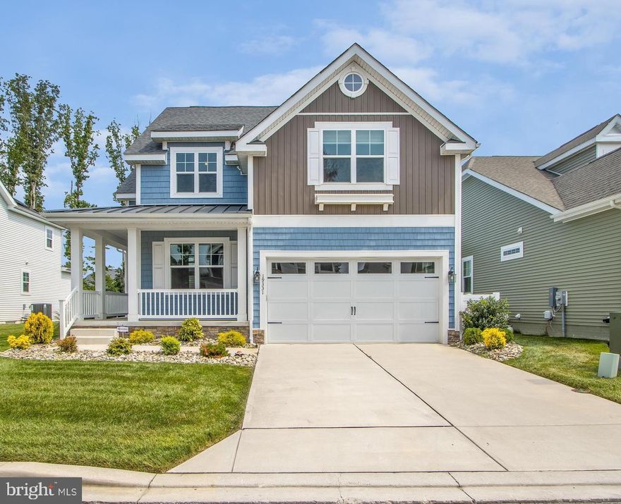 Welcome to your dream home! This stunning coastal-style residence, built in 2021, offers a perfect blend of modern elegance and inviting warmth. With 4 spacious bedrooms (and even room for a fifth!), 3.5 bathrooms, and a finished basement, this home is designed for comfort and functionality. Step inside to discover an open floor plan that seamlessly connects the gourmet kitchen, featuring a large island and top-of-the-line appliances, to the cozy family room, complete with a stunning stone fireplace. The dining area is perfect for gatherings, while the primary suite boasts a luxurious soaking tub, walk-in closet, and direct access to the stone patio, ensuring a private retreat. The interior is adorned with beautiful crown moldings, recessed lighting, and a mix of wood, carpet, and ceramic tile flooring, creating a stylish yet comfortable atmosphere. Enjoy the convenience of main floor laundry while the finished basement offers endless possibilities for customization. Outside, the property is set on a generous lot, complete with exterior lighting and a lawn sprinkler system. Relax on the patio or take advantage of the community amenities, including a refreshing outdoor pool and fitness center. With an attached garage and driveway parking, convenience is at your fingertips. This home is not just a place to live; it's a lifestyle. Experience the perfect blend of luxury and community in this exceptional property. Don’t miss your chance to make it yours! Enjoy as your primary residence, second home, or use as a Weekly &/or Yearround Rental.