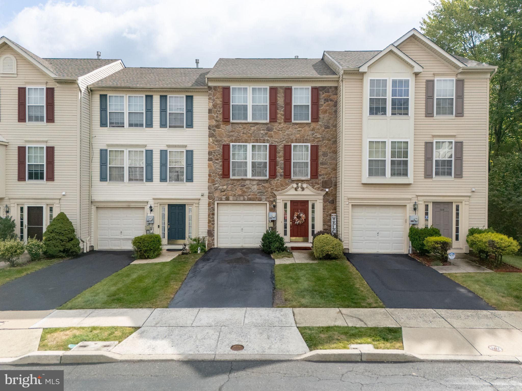 Welcome to 707 Waterway Ct. This charming Quakertown townhome offers a blend of comfort and style. This colonial townhouse features 3 BR, 2.5 BA, and offers over 2200 SF of living space with plenty of space to entertain your guests during holidays and other fun family and friend events. The 1st floor/lower level features a foyer that leads to open an open area family room with a gas fireplace and pool table. Additionally, you will find a laundry area with a brand new washer and powder room. The 2nd level takes you to the kitchen area. The kitchen is equipped with stainless steel appliances and an island to do food prep or casually enjoy your meals. From the kitchen extends an open area/dining room and sunroom. Opposite this dining area is the formal living room. You will also find brand new luxury vinyl plank flooring in the first and second levels. The 3rd level features 3 BR and 2 full bathrooms. There is an attached 1 garage perfect for parking your cars and/or storage. This home is in very close proximity to major highways, hospitals, restaurants, schools, shopping, etc. The home is only one hour from Philadelphia and a little longer from JNYC. Don't miss this opportunity to make 707 Waterway Ct. your new "Home Sweet Home! The home is being sold “AS IS.”