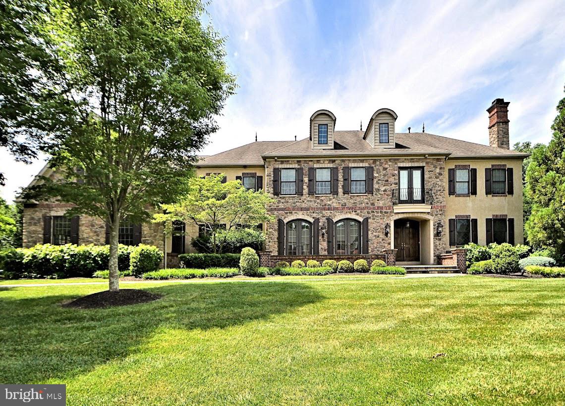 Welcome to our beautiful estate home with 6 bedrooms and 5.1 baths! As you pull up you will fall in love with the curb appeal. Slate walk way leads to the open foyer and grand staircase. Beautiful and traditional open floor pan. Main floor with living room with gas fireplace, large dining room off the spacious gourmet kitchen with large island with sink, granite counter tops, Wolf gas cook top and Miele dishwasher ,sub-zero refrigerator. You will love the stone wall that leads to the comfortable family room with a marble gas fireplace. Large office with built ins, and wet bar, mud room area off 3 car garage with access to the 1/2 bath and 2 large pantries! Hardwood floors through out main floor and 9 foot ceilings. 2 stair cases will take you down to the finished basement with lots of fun options with a full bathroom with heated floor. Also lots of storage in the walk out basement. Basement could be a 7th bedroom, great room, family room, game room etc. There are also 2 staircases will take you to the 2nd floor. The front grand turned stair case and the private back staircase will take you to the 2nd floor where we have 5 bedrooms and 4 full bathrooms including a wonderful full bath in main bedroom with free standing tub, Jack and Jill suite along with a princess suite and full hall bath. Full laundry and another stair case that leads us up to the 3rd floor bedroom! This room is huge with its own split system for heat and air. So many fun options here too! Beautiful expanded lot. The current owners purchased an adjoining piece of land in back of a little over .44 acres to expand the lot to 1.24 acres. Allowing more impervious space and privacy. Lovely/private back yard with paver and flagstone patio that has built in gas grill and 2 sided fireplace. Many other upgrades including a Generac stand by generator, Original Philadelphia gas street light (electrified),Cast iron fountain , exterior security cameras, back up sump pump system, newer gas heat, newer central air, Wi-Fi stereo system through out. Beautiful neighborhood, great schools, convenient location. Quality home built by Mike Evans Builders. This home truly has it all. Please check out the 3D virtual tour and floor plan! Clear stucco report! Wonderful opportunity!