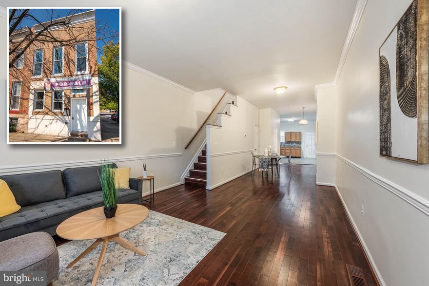 INCREDIBLE VALUE FOR THIS SPACIOUS END OF GROUP UPDATED HOME!  Features include wood flooring throughout, a spacious living room & dining area with chair railing & crown molding, a large kitchen with ample cabinet space, a main level full bath, upper level with 3 generously sized bedrooms & a 2nd full bath, a full basement with laundry area that's perfect for storage, and a rear patio!