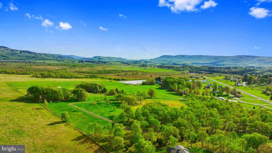 "14 +/- ACRES in Appalachian Ski Town" Nestled in the heart of Canaan Valley with views of both Timberline Mountain Ski Slopes & Canaan Valley Resort! This special property boasts level, usable acreage while bordered by the Canaan Valley National Wildlife Refuge. Freshly installed gravel circular drive. Possibilities are truly endless here, build your dream home, multiple homes, or separate community. Enjoy all the activities this 4 season property provides.. view wildlife overlooking the refuge & Blackwater River, hunt, fish, hike, mountain bike, ski, & golf. Panoramic land mixed with hardwoods perfectly placed in the Appalachian Mountains. Canaan Airport minutes away. Take advantage of this dream property in a resort community with NO RESTRICTIONS. ADDITIONAL LAND AVAILABLE. Call today for your Private showing!