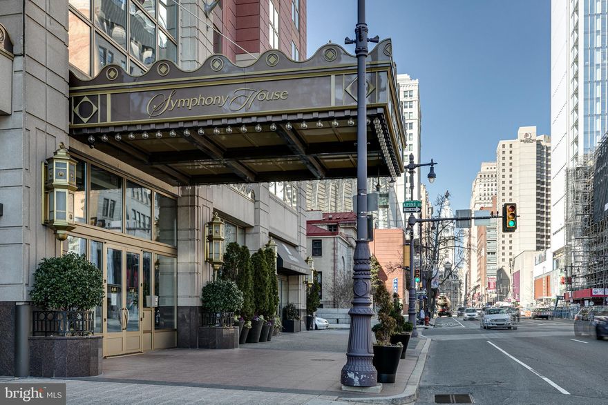 Truly remarkable and sitting 28 floors above Broad Street is unit 2801 at the prestigious Symphony House.  Featuring  2,445 square feet of gorgeous living space w/three outdoor spaces including a spectacular 500 sq/ft. completely Private Terrace showcasing one of a kind 270 degree views of all that the city sky line has to offer- incredible during the day and completely special come nightfall.  Enter the large Foyer and be pulled to the expansive open Dining and Living areas w/hardwood floors, 12 ft. ceilings and a magnificent glass to square foot ratio w/oversized windows and double glass door leading to the main terrace.  Fantastically sized and suitable for dining and entertaining under the stars and maximizing the unique opportunity to blend indoor/outdoor living in a city high rise.  The updated Kitchen has a stainless steel Viking six-burner range and paneled Sub-Zero fridge,  stone countertops provide lots of prep space and ample warm wood cabinets are set against a glass tile backsplash.  The Primary Suite features a completely renovated marble tile bathroom w/soaking tub, oversized glass-enclosed shower, dual vanity and radiant heated floor along w/an abundance of custom closet spaces and its own private covered Balcony.  There are 3 additional Bedrooms, two w/en-suite baths and a tasteful marble powder room off the living area.  A 'bonus' Den space w/pocket door, separate from the bedroom count, is perfect for an added work from home space, and there is a large laundry room.  Two Garage Parking spaces and an oversized storage unit are also included.  Enjoy all that this perfect center city location has to offer just a few blocks from Rittenhouse or Washington Square and set prominently along the Avenue of the Arts.  Setting the bar for service and amenities Symphony House has a 24-hour doorperson/concierge, 65 foot heated indoor pool, top-of-line fitness center,  delightful outdoor terraces, clubroom, wine cellar/tasting area, and Chef's catering facility.  Schedule a private showing today.