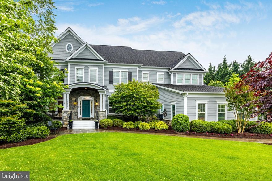 Wow, newer construction in Luxmanor, on a cul-de-sac, and a nearly half-acre level lot!  This one checks all the boxes.  From the welcoming slate walkway and front porch, enter the freshly painted foyer and appreciate the 10 foot ceilings on the main level and the elegant staircase – one of two staircases to the upper level.  The main floor has it all:  the coveted home office with custom built-ins, the elegant living and dining rooms, separated by a butler’s pantry with a wine fridge, the gourmet kitchen with newer Architectural Ceramics backsplash, Thermador double wall ovens, a Viking 6-burner cooktop, a Bosch dishwasher next to the sink, with the ideal kitchen window, and a Fisher Paykel drawer dishwasher in the center island with a second sink and seating for four, a desk in the kitchen AND a walk-in pantry.  The main level also includes a large eating area in the kitchen, which all integrates with the perfect family room, with a tray ceiling, one of three gas fireplaces, and a custom screened porch off the family room.  For those warmer spring or cooler summer days, open the door to the screened porch for true indoor/outdoor living.   Off the kitchen, French doors open to the composite deck: the perfect spot for the grilling.  The backyard is fully fenced and includes a slate path, pergola and gas-plumbed fire pit.  Back inside, don’t miss the large mudroom with cubbies and closet space, and a second clothes dryer, conveniently located where you enter from the three-car garage.  The garage includes two 220V outlets.  Up the second staircase from the kitchen, the upper level includes five bedrooms and four full baths, including the spacious primary suite with the second gas fireplace, a walk-in closet with custom built-ins, and a spacious primary bathroom with a huge shower and a separate soaking tub.  One added convenience: the upstairs laundry room with newer LG machines and granite countertops.  On the lower level, you’ll find a generous rec room with its own bar area, a workout room with a rubber floor, a media/gaming room, a powder room, and bedroom number six with its own en-suite bath and walk-up exit to the backyard.   The home is equipped with a newer water heater (2019) with an additional storage tank, a dual zoned HVAC System which is an energy efficient geothermal system, with furnace humidifier and electronic air cleaner.  The home also includes an inside sprinkler system and an exterior irrigation system.  All of this, and all the North Bethesda neighborhood has to offer:  easy access to commuter routes and Red Line Metro, close to shopping, restaurants and more at nearby Pike and Rose to the north, Wildwood Shopping Center to the south, and refreshed Cabin John Village to the west with more shopping and dining options.  Looking for recreation?  The Tilden Woods Pool is just down Tilden Lane, with memberships available.  Cabin John Park is just down Tuckerman Lane, with its playgrounds, trails, ice rink and more.  With all of these amenities, inside and out, this is the perfect place to call “home!”