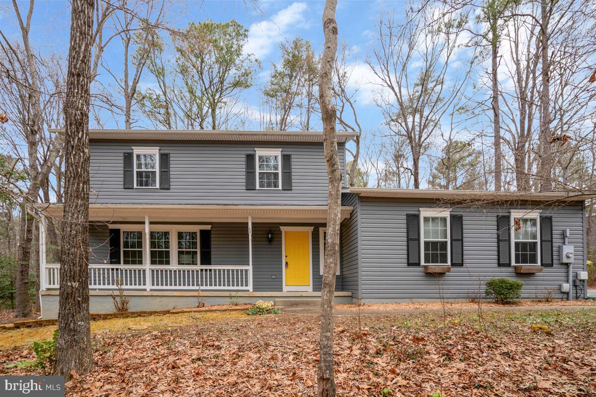 This 4 bedroom home is located on a full acre corner lot on a quiet street in Wildewood Neighborhood One and features an attached 2-car garage.
The open floor plan features clear sight lines from the kitchen through the common room to a large fireplace, and the dining room flows into the living room to create a wide, comfortable, multi-use space for hosting friends and family, sharing meals, and spreading out.
The primary bedroom enjoys lots of natural light and features an attached full bathroom. The three additional bedrooms can each comfortably accommodate a full size bed, and there is a second full bathroom in the upstairs hallway.
This home has been attentively maintained. The hardwood floors on the main level have been re-finished, and new carpets were installed in 2021. In addition, in 2018 the roof and siding were replaced and all new windows were installed. The property is sited on a full acre and surrounded by mature pines and hardwoods, a far larger lot size than is typical of newer construction in Wildewood. There is a two-car attached garage and an extra-large parking pad, providing lots of space for visitors.
Located towards the front of the Wildewood neighborhood, this house is very convenient to all major amenities. Grocery stores, shopping, movie theaters, and restaurants are five minutes away. The next owners will enjoy access to the Wildewood Neighborhood One community trails, recreation area, tennis courts, and club house as well. This house is also only a 10 minute drive to Solomons Island, a 12 minute drive to PAX River NAS, and a 12 minute drive to downtown Leonardtown. With such great care taken to prepare the home for its next owners, a convenient location and a reasonable price for this popular neighborhood, all that's left to do is move in.