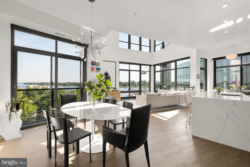 Residence 401,  is a three bedroom, 3 full bathroom penthouse duplex with sweeping waterfront views of the celebrated Washington Channel, pristine Waterfront Park, and Hains Point, blending total tranquility with delightful amenities.