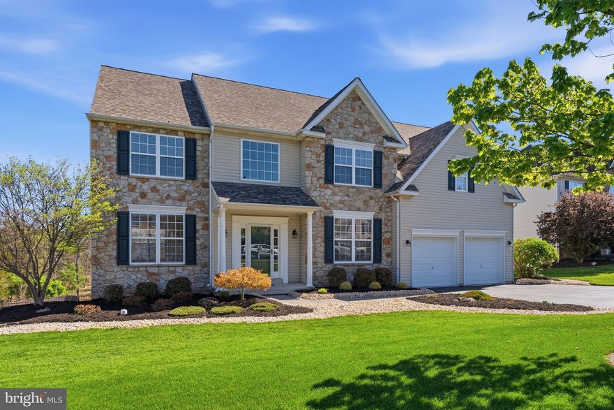 Here is the one that you have been waiting for and not to be missed! Located in the beautiful Windy Creek development in New Hanover Twp., this 4 bedroom, 3 full, 1- 1/2 bathroom home has it all! From the moment that you arrive you will immediately see the pride of ownership along with great curb appeal!  The sellers have just mulched, added stone and  power washed. These original owners are pleased to offer their home for sale! Step inside where you will see the soaring 2 story center foyer with turned staircase.  Located to the left is the formal living room with crown molding and a double window for added light that adjoins the formal Dining room with both crown molding and chair rail and another double window. Located on the right of the foyer is the main floor study with double door entry.  Make your way past the coat closet and the totally remodeled powder room to the large Kitchen with breakfast area and island with seating for 2. The cabinetry was refaced, laminate counters, tile backsplash, gas range with microwave above, double sink with disposal and a palladium window to look out to the picturesque backyard! ( Just wait til we get to that)! The large breakfast area accesses the sliders to the back deck.  The 2 story Family room is amazing with the floor to ceiling stone wall surrounding the gas fireplace, a huge triple window across the back of the house and a ceiling fan and back staircase. Tucked off the side is a large closet and then the laundry room with utility sink and tile flooring that leads to the oversize 2 car garage. Make your way up either the front or back stairs to the Primary Bedroom suite featuring 10' ceilings, a large double window, ceiling fan, 2 walk in closets + a linen closet and a primary bathroom also with a 10' ceiling, double vanity, separate shower stall, large soaking tub and tile flooring.  Your own personal retreat to get away from it all! Finishing off this level are 3 nice size bedrooms sharing a hall bathroom with a double vanity and tile flooring. Next comes the Finished basement with sliders that lead out to the back paver patio. Down here you will find a large area for entertaining or watching tv, recessed lighting throughout along with a bar area,  a full bathroom with shower, and 2 more rooms that could be used as an additional office or playroom or personal work out room. So many options to choose from and plenty of closets for storage along with an additional storage room. But we are not done! To top it off, be in before the summer to enjoy your own resort like backyard.  The beautiful inground heated pool can be accessed via the composite deck or paver patio or gates. There is a beautiful aluminum fence that surrounds the pool with 3 gates and a storage shed. With NO lack of privacy here as the property backs to open space and trees.  No need to go on vacation with this backyard and all the amenities this home features.  The perfect spot for all those summer gatherings! In getting ready to list, the sellers just had most of the main and 2nd floor painted to make it fresh for the new owners!  In addition, the HVAC was replaced in 2023  and the roof in 2020 . Make this your forever home before it is too late! Close by to shopping, dining and major routes. * All dimensions of lots and building/room sizes are approximate and should be verified by the  Buyer(s) for accuracy. Schedule your visit today and make it your own!!!