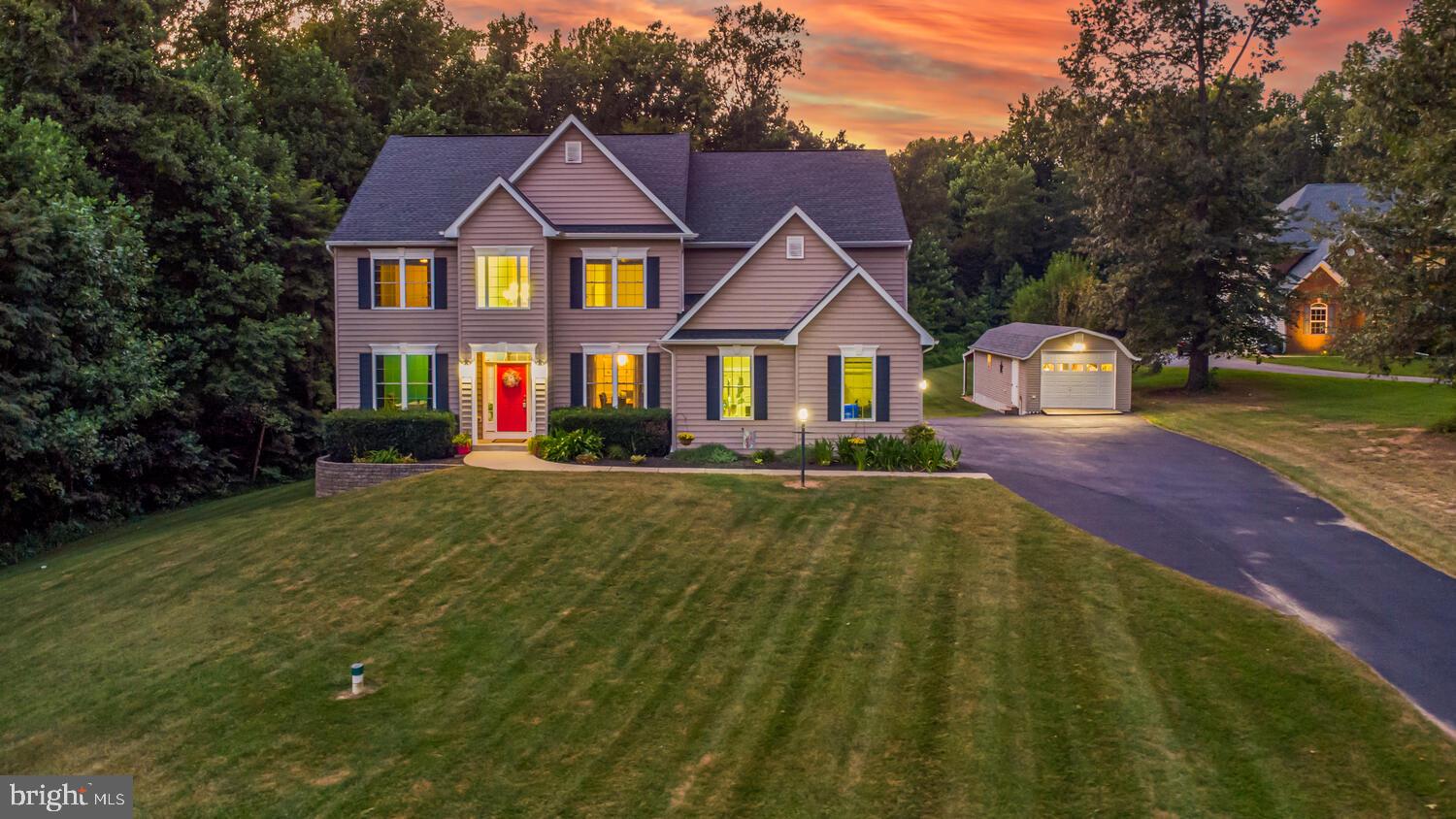 This Home Has It All – Location, Amenities & Space! From the moment you arrive, you'll know this home is something special. Beautifully landscaped and meticulously maintained, it offers the perfect blend of luxury, comfort, and functionality—inside and out. Step inside to discover a spacious layout designed for both everyday living and elegant entertaining. The main level boasts a desirable in-law suite with private bath, ideal for multigenerational living or hosting guests in style. A gourmet kitchen with high-end finishes opens to a welcoming family room featuring a cozy gas fireplace, while a separate dining room and a dedicated office add to the home's thoughtful design. A convenient half bath completes the main level.
Upstairs, you’ll find five generously sized bedrooms and three full baths, including a luxurious primary suite with a sitting area, large walk-in closet, soaking tub and separate shower. Laundry is located on the upper level for added convenience. The home also features a full basement with a potential 7th bedroom and full bath, a large rec area, and abundant storage space—perfect for any lifestyle. Step outside into your own private backyard oasis. Whether relaxing or entertaining, you'll love the multi-level decks, retractable awning, and your very own swim spa with hot tub, all overlooking a beautifully manicured yard. Additional highlights include a 2-car attached garage, oversized driveway, and a detached garage with heat, A/C, and electric—perfect for a workshop or additional storage. Plus, lean-to's behind both the garage and shed provide extra space for lawn equipment or outdoor gear. All of this in a prime location close to schools, shopping, dining, and more. This is the one you've been waiting for—schedule your private showing today!