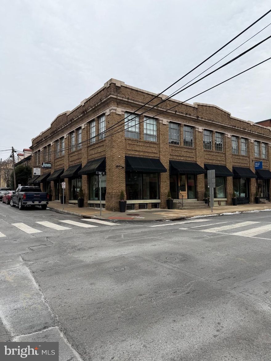 Welcome to the Bond Building — a rare investment opportunity in the heart of Newtown Borough.
This exceptional property offers a unique blend of open, flexible spaces, modern office layouts, dedicated showroom areas, soaring ceilings, and a sought-after industrial aesthetic.
Ideally located in the center of town—directly across from the State Store and the proposed Liberty Square redevelopment—this building is positioned for both immediate income and long-term appreciation.
The property features over 15,000 square feet of fully renovated, sprinklered space, along with on-site parking. It is currently configured into six office and showroom units and is fully leased, providing strong, stable cash flow. A new owner also has the opportunity to occupy one of the spaces if desired.
Approximate 7% cap rate, the Bond Building represents one of the premier commercial investment opportunities in Newtown.