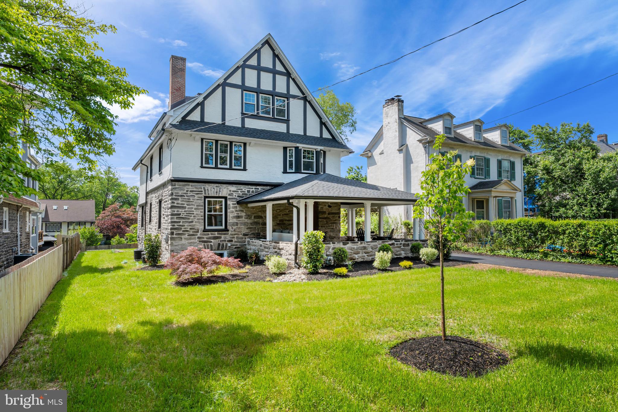 Stunning Fully Renovated Home in the Heart of Merion Station! 726 S Highland Ave has been meticulously restored and fully reimagined to blend traditional and charming 1900's feel with brand new, top-to-bottom features and amenities. This home offers over 5,000 sq ft of beautifully finished living space in the coveted Lower Merion School District, with 6-bedrooms, 4.5-bathrooms across three spacious levels and a fully finished basement.
Step inside through the refinished original oak front door and be greeted by an open-concept floor plan featuring a grand formal living room with a wood-burning fireplace wrapped in marble, a chef’s dream kitchen with oversized island, custom cabinetry, quartz countertops, under-cabinet and toe-kick lighting, and a built-in mini bar with drink fridge. The oversized adjoining dining area is ideal for entertaining.
The first floor also boasts a laundry room with new washer/dryer, mudroom, powder room, and refinished 3/4” solid hardwood floors throughout. Two staircases, including one with refinished over-the-post walnut banisters, lead to the upper levels.
The second floor features a luxurious primary suite with an en-suite bathroom, custom glass shower, dual vanity, and a large walk-in California closet. Two additional bedrooms share a stylish full bath with a tub/shower combo. Upstairs on the third floor, you'll find three more spacious bedrooms—perfect for a guest suite, home office, or playroom—and another full bath.
The finished lower level adds approx. 1,000 sq ft of living space, complete with a full bath, recessed lighting, new flooring, a large storage area, and walkout access to a private, professionally landscaped backyard. Enjoy your mornings and evenings on the oversized covered front porch with refinished heart pine flooring and exterior lighting/fan, or on the brand new huge composite deck and privately lush lawn.
Additional highlights include:
-New energy-efficient 2-zone HVAC & insulation
-Tankless hot water system with circulation pump
-California closets throughout
-Detached oversized 2-car garage with 12’ ceilings, attic storage & electrical hookup
-Walking distance to the train station
This turnkey gem combines elegance, functionality, and location—offering a rare opportunity to own a like-new home in a historic, walkable neighborhood in Lower Merion SD.