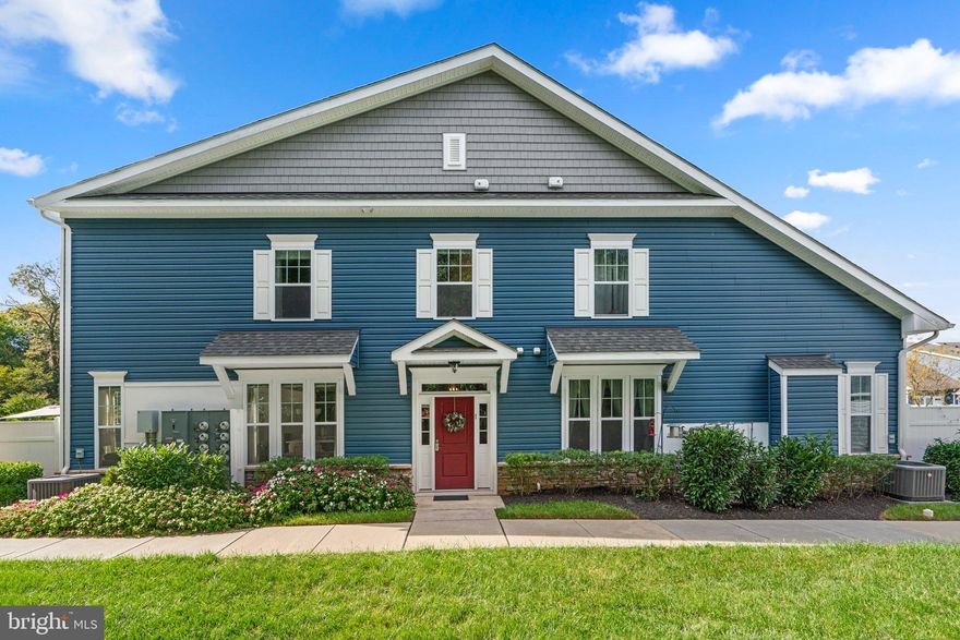 Welcome to 1801 Kathryns Ct #1, located in the highly desirable community of Hopkins Landing! This stunning, like-new home showcases impeccable maintenance and features neutral finishes throughout.
As you approach, you'll be greeted by impressive curb appeal and beautifully landscaped grounds. Step inside to a spacious foyer that leads to the main level, where gleaming hardwood floors, recessed lighting, and abundant natural light create a warm and inviting atmosphere. The upgraded kitchen is a chef's dream, featuring 42" cabinets, quartz countertops, a pantry, a gas range, a stylish backsplash, stainless steel appliances, ample cabinet space, and a large island with seating. The adjacent dining area is perfect for entertaining family and friends. The two-story family room is a highlight, offering generous space, a cozy gas fireplace, and breathtaking views of the tranquil sanctuary in the backyard. Step outside to the patio, surrounded by lush greenery and a serene pond, making this outdoor space a peaceful retreat. The main level also hosts a spacious primary suite with a tray ceiling, a walk-in closet, and an en-suite bath featuring dual sinks and a walk-in shower. A laundry room with additional cabinetry and a half bath complete this level. The home is also equipped with a central vacuum system! Upstairs, you'll find two additional bedrooms, an office, and another full bath, perfect for family or guests. The property includes a one-car detached garage (deeded separately) with a built-in workbench and a dedicated driveway, plus an extra parking spot in front of the home. The community offers fantastic amenities, including walking trails along the Chesapeake Bay, access to boat slips for purchase or rent at the marina, and a condo fee that covers water, lawn care, snow removal, a community pool, and walking paths. This home is a must-see! Don’t wait—this gem won’t last long!