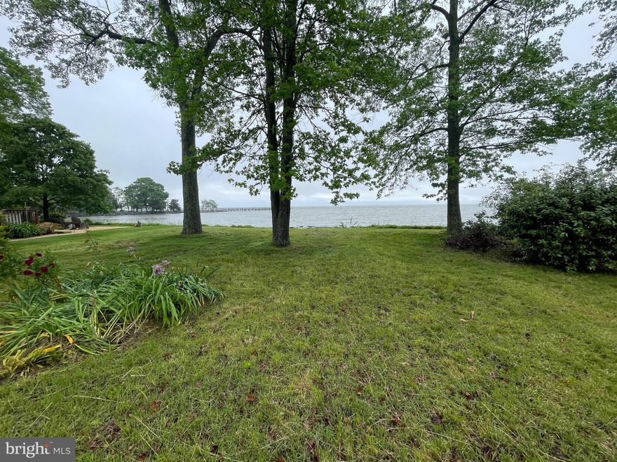 Unique Waterfront Lot Opportunity at Columbia Beach – Build Your Dream Home on the Chesapeake Bay. Don't miss this rare chance to own a buildable waterfront lot in the serene, gated community of Columbia Beach, offering breathtaking views of the Chesapeake Bay. This exclusive neighborhood is just 30 minutes from the I-495 Beltway and Annapolis, and only 45 minutes to Washington, D.C., and the Woodrow Wilson Bridge in Virginia.  Community Highlights:  Gated access for privacy and peace of mind.  Stunning bayfront scenery.  Boat ramp, short pier, and long pier for water access.  Family-friendly playgrounds.  Sports facilities including tennis, basketball, and pickleball.  Pet-friendly with a commitment to preserving the peaceful environment.  Columbia Beach is served by Public Sewer and is known for its quiet streets, low traffic, and tight-knit community, making it an ideal setting for a primary residence or vacation getaway.  AirBNB is allowed.  Lot Details:  Approx 60'x100' Buildable waterfront lot with completed boundary survey (available via listing documents).  20year loan available with 25% down, local and competitive lender. Listed separately as a "House-to-Be-Built" option with flexible design options.  Ideal for a custom home measuring up to 46' wide x 32' deep each level.   Potential for 2 finished levels plus attic, and designed for: 5BED/4BH.  Main level bedroom with full bath – wheelchair accessible.  2-car garage.  Deck and/or balcony for stunning water views. "Qualified buyers can finance the entire project — including lot and building — with as little as 5% down, thanks to Construction-to-Permanent loans that may allow for 10%, 15%, or even 20% equity from the start."   An experienced builder is ready to work with you to create a custom dream home, offering competitive pricing and may even absorb a portion of the lot cost.  For additional Info on Columbia Beach: Visit the Columbia Beach page to learn more about the community.  Lot owner reserves the right to accept or reject any offer.