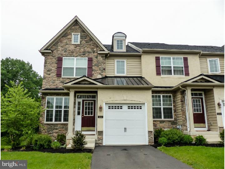 OPEN HOUSE SUNDAY 1-3PM FOR THIS Beautifully decorated Brittany II set in an upscale townhome community located in the heart of Bucks County. The community offers a pool, fitness center and has convenient access to 202, 413 and 611. This Stone Front End Unit boasts gorgeous hardwood floors throughout the entire first floor including the bright and airy Living Rm with alcove, crown molding and recessed lighting. Moving into the spacious formal dining room where entertaining will be a joy with a pass through window to the kitchen allowing for chef interactions and easy clean up. Passing a powder room and the lower level entry the floor plan unfolds to the family room, a neutral d cor, a fireplace adding an element of coziness and the numerous windows filling the space with natural light. Enjoy the openness of this gourmet style kitchen featuring beautiful wood cabinetry, stainless steel appliance including double oven and built-in microwave, gleaming granite with breakfast bar with barstool seating option. The adjoining casual dining area lends access to the deck and enjoys the backyard views. Upstairs the master suite is a spacious room accented with a tray ceiling, allows for a sitting area, and features a very deep walk-in closet. The sizable private bath has an elongated double vanity, soaking tub and a separate walk-in glass shower enclosure. Two additional bedroom are both nicely sized boasts tray ceilings, nice light and double closets. The shared hall bath and oversized laundry room complete this level. Adding an enormous amount of living space to the home the walk-out lower level can become a media center, game room, fitness center or whatever fits your family lifestyle. There is also plenty of storage on this level. Call today this home is super clean, and eager to be filled with your family's new memories.