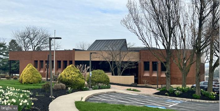 Upper level is 13,031 SF and features large open lobby/reception area, multiple large rooms that were previously used as classrooms and meetings spaces, private offices, and restrooms. Building also features on-site parking for approximately 75 vehicles.