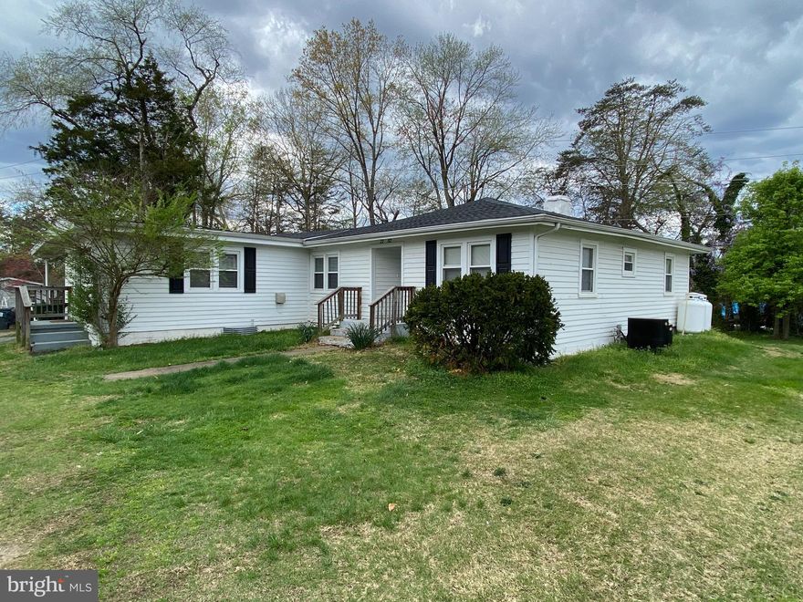 Wonderfully maintained home set on a large lot on a private drive. This home is drenched with natural sunlight. Hardwood floors, large living space, beautiful kitchen with island. Lawn service and water/sewer is included in rent. Make this your home today! Close to  I95, commuter lots, Quantico and  all major retailer and restaurants you could want. All applicants will be subject to employment verification, rental history verification, criminal history screening and credit screening.