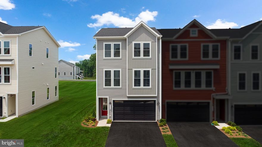 Say hello to your new home! This brand new END UNIT TOWNHOME is ready for you to move in IMMEDIATELY! Step into contemporary luxury with the captivating Teagan 24-F2 floorplan by Van Metre Homes in SNOWDEN BRIDGE. Spanning 2,388 finished square feet across three meticulously crafted levels, this exquisite townhome offers an unparalleled blend of style, comfort, and convenience. Boasting three bedrooms, two full and two half bathrooms, with a convenient 2-car front load garage, this residence is designed to exceed expectations at every turn. As you step inside, you'll find a versatile multipurpose rec room, equipped with a half bath, this space provides ample opportunity for relaxation and entertainment. Venturing up your oak stairs, found throughout the home, you’ll be greeted by a meticulously crafted living space adorned with 9' ceilings, this main level showcases a sprawling great room and dining area, seamlessly connected to a captivating kitchen featuring a central island, upgraded cabinets, tile backsplash, quartz countertops, wood shelves within your walk-in pantry, and luxury vinyl plank flooring – the epitome of modern elegance and functionality. Enjoy an additional reading nook perfect for everyday moments. After making your way to the upper level, you’ll discover the haven of relaxation that exists within the impressive primary suite, complete with a generous walk-in closet and a luxurious 4-piece bathroom boasting double sinks and a frameless shower with a built-in seat – the perfect retreat after a long day. This level also hosts two additional bedrooms, another full bath, and a convenient upstairs laundry room, offering unparalleled convenience and comfort. Being a new build, your home is constructed to the highest energy efficiency standards, comes with a post-settlement warranty, and has never been lived in before! Don't miss out on this incredible opportunity to own a home that seamlessly combines modern luxury, thoughtful design, and resides within a prime, highly desired location. Schedule your appointment today! ----- Discover Snowden Bridge, a premier master-planned community located within the heart of the Shenandoah Valley, only minutes from the Downtown Winchester area. With its selection of townhomes and single-family homes, Snowden Bridge creates the perfect opportunity to create nurturing relationships with neighbors; where life revolves around connection, recreation, and relaxation. Surrounded by the hills of the Blue Ridge Mountains, this community offers outstanding resort style amenities, including swimming pools - inclusive of a splash park for the kids, a 15,000 sq.ft Indoor Sportsplex with basketball, tennis and volleyball courts, a dog park, playgrounds, a picnic pavilion, bike racetrack, miles of walking trails, an on-site daycare and on-site elementary school. End your days with family and friends catching stunning sunsets. Moreover, Snowden Bridge is conveniently located minutes away from major roadways & interstates such as route 7, I-81 and I-66, ensuring seamless connectivity to the region. Offering the perfect blend of small-town charm and modern-day convenience, easily access Snowden Bridge’s closest shopping center, Rutherford’s Crossing, located only minutes away, hosting major retailers, restaurants, and local boutiques! Embrace the laughter and joys of children safely playing outside together again. Your exceptional community experience awaits. ----- Take advantage of closing cost assistance by choosing Intercoastal Mortgage and Walker Title. ----- Other homes sites and delivery dates may be available. ----- Pricing, incentives, and homesite availability are subject to change. Photos are used for illustrative purposes only. For details, please consult the Community Experience Team.