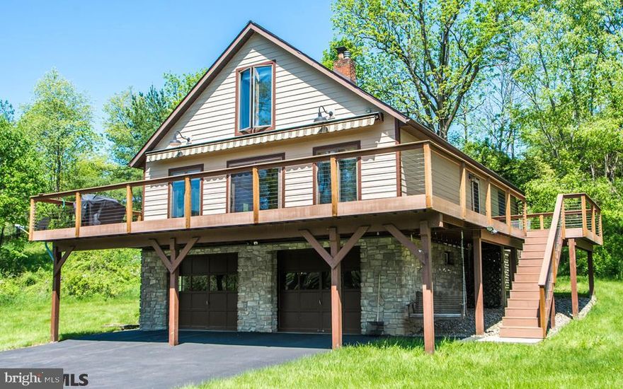 Lovely private setting. Situated on 7.7 acres featuring 4 bedrooms and 2 baths, Two car garage, pole barn, large deck with a retractable awning. Seasonal stream and walking trails. Geo Thermal heat and cooling. Radiant floor heat in the kitchen and bathroom. Easy commute to State College!