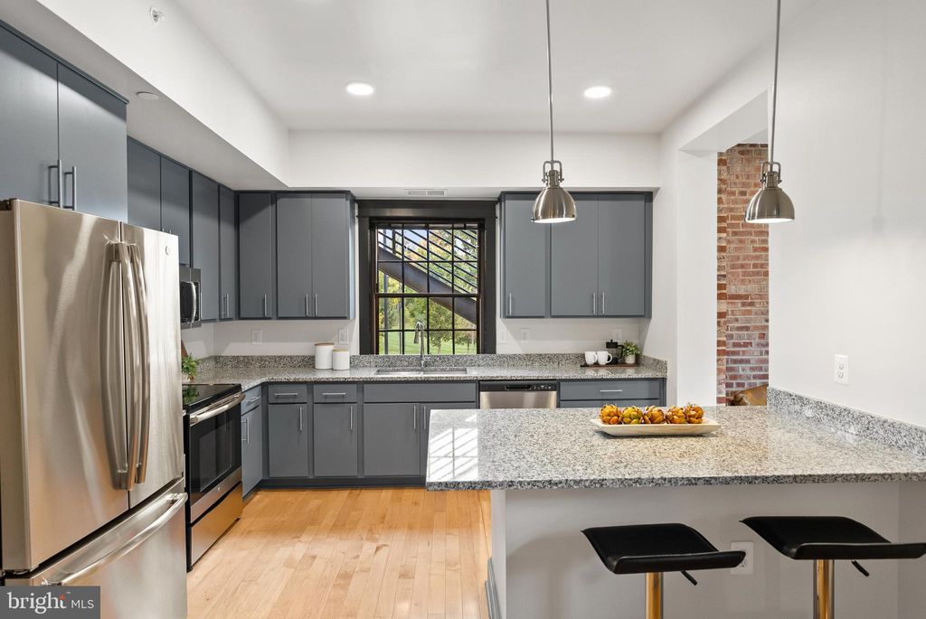 Photo of 9071 Power House Road #102, LORTON, VA 22079 (MLS # VAFX2275324)