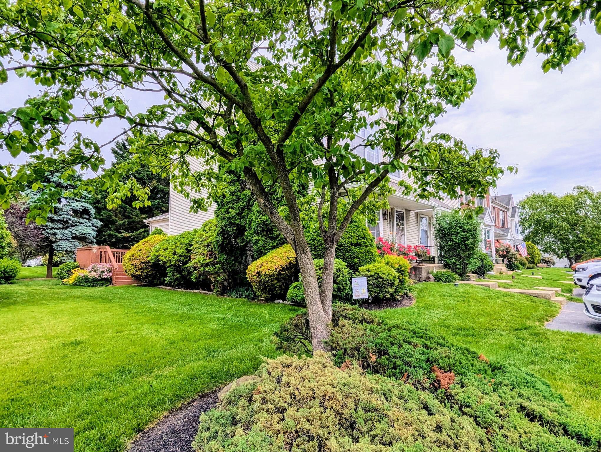 Concord Hills, a desirable and pretty community in Aston. This spacious end unit is 20' wide with multiple gathering spaces. Enter into the spacious living room with a bonus side window allowing natural sunlight to enter the space, dining area with a chair rail and hardwood flooring. The kitchen has hardwood flooring, a pantry, breakfast bar, pretty cabinetry and dishwasher. You will enjoy the convenience of a main level powder room and a family room with cathedral ceiling, a tall side window and two sets of sliding glass doors exiting to the large rear deck. The property is surrounded by pretty landscaping, and mature evergreens that add privacy to the deck area, a great gathering space to entertain. The upper level has two spacious bedrooms both with 2 closets. A spacious Jack & Jill bathroom with a double vanity, two sinks, linen closet and tile flooring. The lower level offers more space to gather in the recreation room with multiple storage closets to keep items organized, storage room and laundry. There is a private driveway for two cars. A short drive to Neumann University. Close to I-95 to access the Philadelphia international Airport, Route 202, NJ and DE. The property is being sold in As Is Condition, the buyer will pay for and perform any Aston Township repairs to obtain the Certificate Of Occupancy.