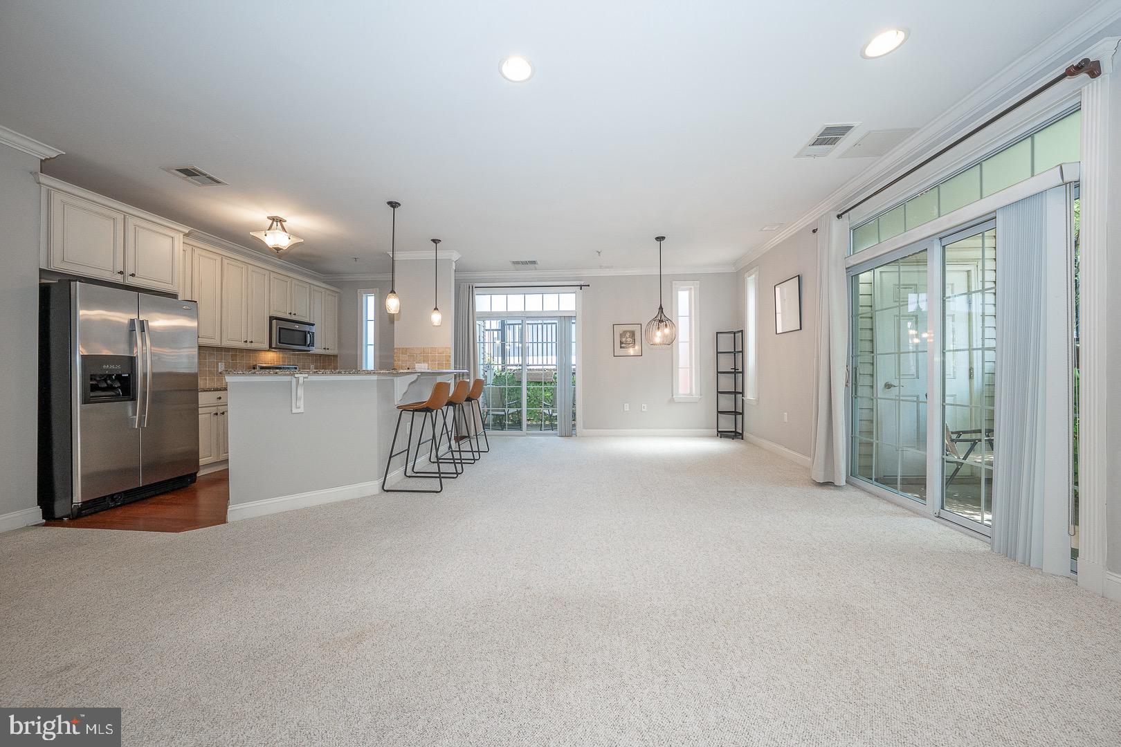 Step into high-end living at one of the most desirable addresses in Conshohocken, The Grande, and walk to all Conshohocken has to offer dining, shops, the train, and Schuylkill River Trail. This stunning 2-bedroom, 2-bath condo is packed with upscale finishes, unbeatable amenities, and extra included perks, all in a prime location just steps from the train, Schuylkill River Trail, and downtown’s best restaurants, bars, and boutiques. The Grande at Riverview community features a full gym, resort-style pool, multiple BBQ areas, and direct access to the walking trail; plus two garage parking spots, high-speed Wi-Fi, and a fully monitored alarm system included in the rent.
Inside, you're welcomed into a beautiful entryway with rich dark hardwood floors, crown molding, and recessed lighting. The open-concept layout seamlessly connects the kitchen, living, and dining areas, designed for both entertaining and everyday luxury. The gourmet kitchen boasts granite countertops, Whirlpool stainless steel appliances, a gas range, pendant lighting, and a large center island with bar seating. A built-in desk and wine rack add the perfect blend of work and style. The sunlit living and dining space opens to two private patios, offering ideal indoor-outdoor flow, and this unit is just steps from the pool and courtyard.
The oversized primary suite is a true retreat, featuring an expansive walk-in closet with motion-activated lighting and a spa-inspired bathroom with dual granite vanities, a soaking tub, and a glass-enclosed shower. The second bedroom and full bath are thoughtfully placed on the opposite side of the home, offering privacy for guests, roommates, or a dedicated office.
Additional features include a laundry room with motion lighting, an oversized coat closet, a built-in sprinkler system, and sleek automatic privacy blinds in the bedrooms. With secure entry and easy access to I-76, I-476, and Center City, this location delivers both comfort and convenience.
This is the one that has it all. Schedule your private showing today.
