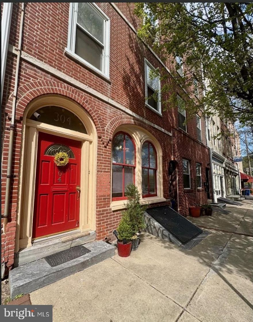 Available starting June 1st! This stunning bi-level apartment on the 2nd floor boasts 2 bedrooms, 2.5 bathrooms, and an impressive rooftop deck! On the first level, you'll find two spacious bedrooms, each with its own full bath, along with a convenient laundry room. Ascend to the upper floor, where the open-concept living room features beautiful hardwood floors, built-in shelving, exposed brick walls, and large windows. A sliding glass French door leads to a fantastic deck with a breathtaking sky view. The kitchen is a chef's dream, complete with maple cabinets, granite countertops, a stylish tile backsplash, stainless steel appliances, a dishwasher, and a bar counter for casual dining. Plus, there’s a convenient powder room located just off the kitchen! If you're seeking a neighborhood with a prime central location, this is the perfect place to call home!