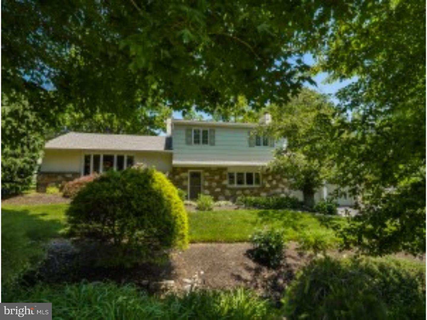 The lush landscaping leads you to this stunning home sitting on .65 acre.  As you enter this home you immediately notice the care taken in the home.  The tile floor open foyer greets you with ample closets.  To the right you enter the cozy but gracious sized great room with bay windows and stone surround wood burning fireplace perfect for the whole family to gather.  The living room will not disappoint with hardwood floors, bay windows for lots of light and french doors leading to the kitchen.  The kitchen will amaze you with vaulted ceilings, skylight, large sitting area with the 3rd bay window, plus huge working island.  Tastefully done there are tile floors, gorgeous wood cabinets, granite counter tops, tile backs plash, stainless appliances with double oven and separate cook top all new within the last few years.  The slider door leads you to a generous size patio area overlooking the expansive rear yard that is fully fenced, meticulously landscaped, plus a shed for extra storage.  The upper level has hardwood floors throughout the hall and 3 bedrooms, and the tastefully updated hall bath has tile tub shower and floors.  The master bedroom has and en suite bath and 2 closets for plenty of storage.  The lower level laundry room will amaze you with large space for storage and inside access to the 2 car garage and half bath.  Some other features in the home are ceiling fans, new driveway, new roof, new A/C, new chimney liner and so much more.