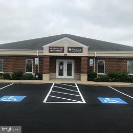 Remarkable Opportunity for Professionals! This exceptional real estate listing presents 6,600 square feet of professional office space, perfectly designed to meet the needs of your business, 5,000 which is leased. Notably, the property is fully handicap accessible, ensuring inclusivity and convenience for all employees, clients, and visitors. Generous on-site parking further adds to the accessibility and ease of use for everyone. The property features a large pylon, offering excellent visibility and a prominent presence for your brand. In addition to its impressive features, the owner is willing to consider owner financing for a qualified buyer, adding a unique and advantageous opportunity to secure this property. Unit 302 has been freshly painted and professionally cleaned.