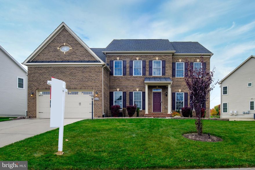 JUST REDUCED $30K... NOW $919,900 ---> QUICK CLOSING POSSIBLE!!!!!
OPEN HOUSE:  SATURDAY, NOVEMBER 4 & SUNDAY, NOVEMBER 5 FROM 11AM TO 1PM.

Looking for a dream house?  Look no further and welcome home to this exquisite luxury home in the Fairwood community of Bowie Maryland. This home is basically brand new, built in 2017 but has a barely lived in look with a neutral color on the walls and so clean and bright!
Walking into the foyer you are greeted with a beautiful staircase, wood floors and architrave moulding that invites you into the cozy sitting/living room. The large dining room has wainscoting moulding that is also an elegant touch for those special family gatherings!
You’ll be wowed with the expansive eat-in island kitchen, lots of cabinets, stainless steel appliances, granite countertops, and a walk-in pantry to hide all your goodies in! The windows of the breakfast nook let in so much natural light.
You will really love the light filled great room. Gather the whole family and friends in this area, this pleasant space can be used to unwind or to entertain with the added benefit of a cozy gas fireplace! 
The primary bedroom retreat is your owner paradise! There is plenty of room here for a king size bed!  A cozy sitting room and a private covered terrace makes it complete to wind down from a busy day. There is his and her walk-in closets and a spa like ensuite bathroom.
There are 4 additional bedrooms each with access to a bathroom. The 5th bedroom is on a separate level.

Come visit today and make this home yours by the holidays!