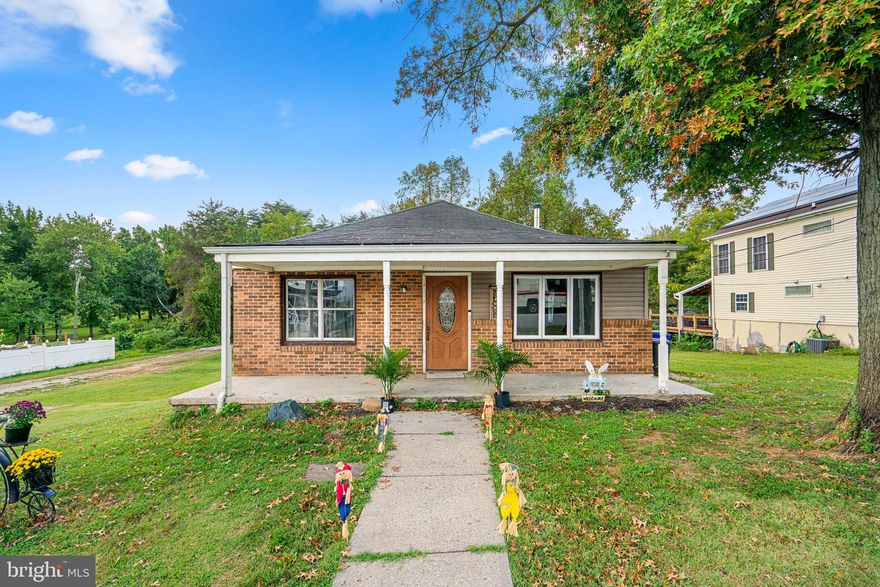 LARGE 3 BEDROOM HOME, ALMOST3000 SQUARE FEET, SITUATED ON HUGE WOODED LOT. NO HOA! The main level of the home has been updated with LVP flooring and features a large gourmet kitchen with stainless steel appliances, big island & lots of counter and storage space. Oversized deck off the kitchen overlooks yard which backs to woods. Spacious family room with high ceilings and skylights, plus pellet stove. The walk-out lower level has been mostly finished, including bathroom space.  Home overall is in good shape, just needs some cosmetics. GREAT LOCATION, less than 5 minutes to I-95, Route 175 & Rte 1. Ft. Meade & BWI airport are only 15 minutes away, Home has been redistricted to new Guilford Park HS.