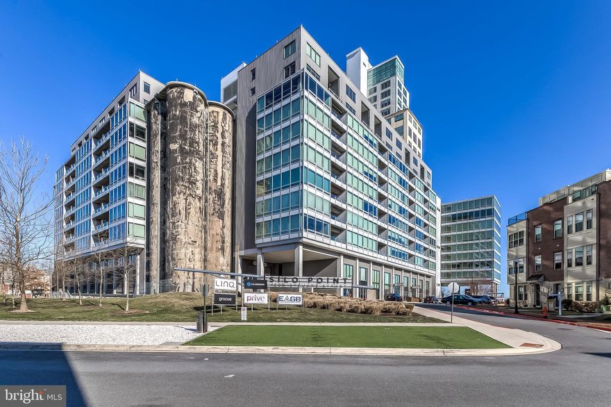 EARLY RELEASE TO MARKET TO ACCOMMODATE SHOWING REQUESTS:  This spacious 1457 SQ FT 1 bed 1.5 bath condo offers 9+' ceilings, HUGE windows, wood floors, a large balcony with views, gourmet kitchen, walk in closet, separate laundry room,  SELLER PAID HOME WARRANTY, & a parking spot that conveys.  The parking spot is on the same level as the home, just past the elevators doors inside the resident garage.  The spa-inspired master bath boasts an oversized soaking tub and dual sinks with marble countertops, making this a true master ensuite bath. Silo Point has 24hr front desk, fitness center, game & conference rooms, pet area, 19th floor Sky Lounge & Courtyard. Short Distance to Fort McHenry & Tide Point, where you can take a water taxi.   Silo Point was originally constructed in 1923 and was once the largest and fastest grain elevator in the world. Today it's an award winning 24 story modern condominium with bits of its history scattered throughout . | ** | PLEASE NOTE: Property is VACANT.  In-person/onsite showings are being permitted. A virtual showing may be scheduled through the listing agent. | ** |