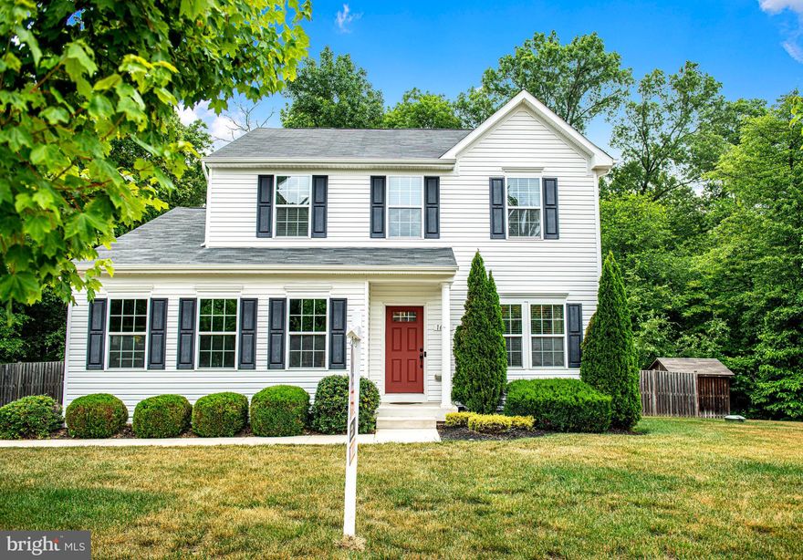 Welcome to this beautiful colonial home featuring 4 bedrooms and 3.5 bathrooms. As you enter, you'll be greeted by a study adorned with built-in shelving, cabinets, and stunning hardwood floors. The great room boasts a cozy gas fireplace and continues the elegance of hardwood flooring. The open and sunlit dine-in kitchen showcases a granite peninsula countertop, a breakfast bar, stainless steel appliances, neutral tile, and a custom pantry with built-in lazy susans. The main level also offers a powder room with a pedestal sink and hardwood flooring, along with convenient laundry facilities. Upstairs, you'll discover 3 bedrooms, a loft/flex space, and all-new carpeting throughout. The primary bedroom suite features crown molding and a chair rail, a walk-in closet with custom shelving, and an ensuite bathroom with double sinks and a tub/shower combination. The 2nd and 3rd bedrooms include decorative molding with chair rails and brand-new neutral carpeting. The upstairs hall bathroom offers a single sink and a tub/shower combination. The versatile loft/flex space on the second floor could easily be transformed into a 5th bedroom if desired and currently serves as an office and sitting area, complete with custom built-in desks made with thick walnut and trimmed in zinc.  The fully finished basement presents an additional bedroom and a full bathroom with a tiled shower stall. Neutral carpeting and custom built-in shelving made from cherry hardwood add to the basement's appeal. The property sits on just under a half-acre lot, surrounded by a conservation area, ensuring privacy. Outdoor amenities include a composite deck, a fully fenced backyard with a shed built into the fencing. Recent updates include a new fridge, dryer, and dishwasher in 2021, as well as a new washing machine in 2020.

In addition to its charming features, this home is situated within a community that offers a playground space complete with picnic tables, providing a perfect spot for outdoor gatherings and recreation. Its central location makes it incredibly convenient for residents, with easy access to Annapolis, Baltimore, and Washington DC. Furthermore, the home is in close proximity to shopping centers and various conveniences, ensuring that daily errands and entertainment options are just a short distance away.