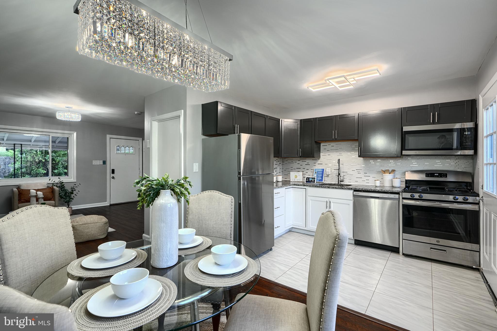SMART is the new LUXURY! First of its kind in the Country Ridge neighborhood located in the Essex area of Baltimore County! Use your phone to lock doors, adjust the temperature, control the lights, and to see who is at the door! On the upper level there are 3 bedrooms and a beautiful bathroom. The home has many windows which allows an abundance of natural light to enter. You will enjoy the beautiful kitchen that has granite counter tops, stainless steel appliances, and a beautiful backsplash. All bathrooms are enhanced with Bluetooth speakers, spa-like shower heads, and elegantly designed tile. The backyard is fenced in. This house will make you feel like you are living a dream everyday!