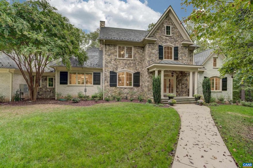 NEW PRICE! An AMAZING value! Elegant home located on 2+ private acres in Keswick Estate. Grand entryway features travertine tile floors, swooping staircase with wrought iron banisters, and stunning chandelier. Entertain in the formal dining room or music room-both with gas fireplaces, ornate detailing and custom trim. Chefs will love the gourmet kitchen with custom wood cabinets, granite counters, large island and Thermador appliances. Kitchen features hickory hardwood floors and flows into the breakfast and hearth rooms making this area a great spot to gather. Main level primary suite features new carpet, sitting area, full walk-in custom closet, and two separate baths - one with jetted soaking tub, custom tile and steam shower-second bath with walk in shower. 4 bedrooms including two with private bathrooms on second floor and a home theater with additional full bathroom on third level. Walk-out lower level features a two bedroom apartment with kitchenette and outdoor access that is great for in-laws or guests.  Additional rec room, craft room, workout room and endless heated pool make this home shine! Enjoy outdoor living on over 500 sqft of bluestone terrace! This home is perfect for multi generation living. 4 car garage,Granite Counter,Wood Cabinets,Fireplace in Dining Room,Fireplace in Family Room,Fireplace in Living Room