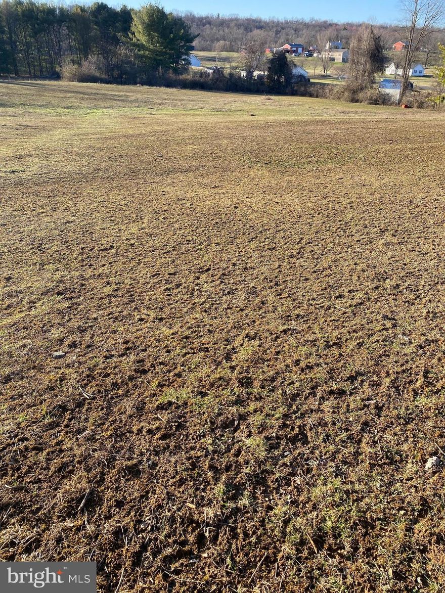 Beautiful 2.07 Acres of raw unrestricted Land in Hedgesville, WV.  This is a nice level lot in a rural setting away from the hustle and bustle but close enough to amenities.  Just perfect for building your dream home.    There is an additional 2.12 acre adjoining lot that is also available, see MLS#  WVBE2027112.  Call for more information today!