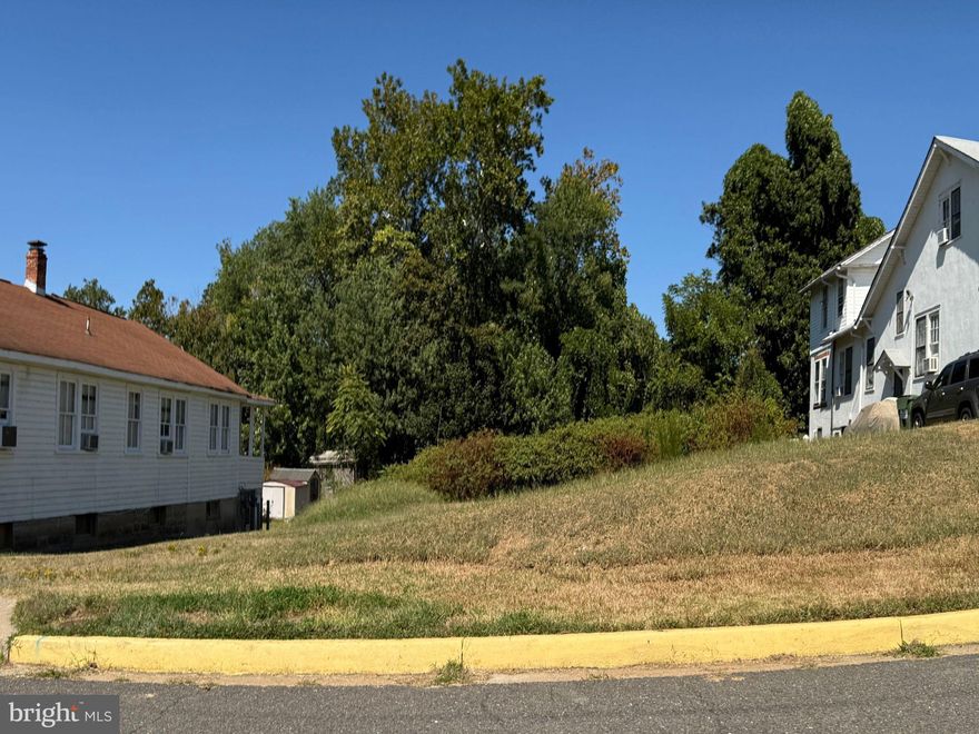 Ready to Build Near Quantico MCB – Rental Income Potential Awaits!

Imagine owning a piece of Quantico���s historic charm with the potential to create something truly special. 
Located a short distance from the front gate of Marine Corps Base Quantico, this 5,001 sq ft lot at 223 3rd Ave offers a rare opportunity for builders, investors, or visionary developers seeking to create a duplex or small multi-family housing in a walkable, transit-connected community.

This is more than just a parcel; this is a canvas for generating rental income, building future equity, and driving strategic growth. Zoned TOWN: RES, the lot is well-suited for a modern duplex or up to four units, depending on final planning and engineering. Whether you’re a local builder expanding your portfolio or a developer focused on the high-demand rental market near military bases, this property checks every box.

Nestled in the heart of the Quantico Marine Corps base, the established "Town of Quantico" is a grid-style neighborhood. The lot offers easy access to the VRE (Virginia Railway Express), charming local shops, and key services. The consistent rental demand from military service members, government professionals, and regional commuters ensures stability and return on investment. With a flat topography, minimal preparation is required, and municipal utilities are nearby, simplifying the build process.

The Town of Quantico has long been a hub of security, service, and community, and now, it’s a prime market for thoughtful infill development. If you’ve been searching for a development-ready site where location, zoning, and long-term potential align, this is your moment.

⚠️ Land Use Disclaimer:

Any references to future development potential, including duplex or multi-family use, are for informational purposes only. All buyers and agents must independently verify land use, zoning, and build feasibility with the Town of Quantico and local authorities. No specific development outcomes are offered or implied as part of this sale.