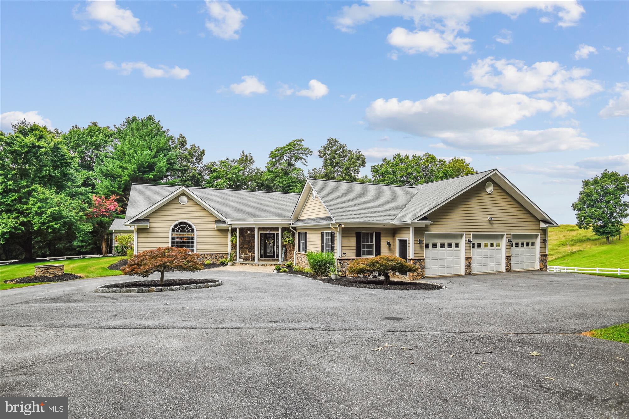 Welcome to 4162 Bill Moxley Road. This completely custom meticulously maintained home sits on nearly 7.5 acres with a pool and barn perfect for horses. The home has 5 bedrooms and 6 bathrooms. As you enter the front doors you come into the heart of the home, a large family room with high ceilings and hardwood floors. The family room opens up to the kitchen and a sitting room space with a beautiful stone fireplace. The kitchen is updated with stainless steel appliances including a commercial grade stove and refrigerator. The breakfast nook and large pantry are off the kitchen, as well as a Trex deck overlooking the pool. The primary suite has its own wing of the house with sitting area space and private access to the back deck. The primary bathroom has a separate oversized shower and jetted tub, tons of mirrors and leads into a huge fully custom closet. The opposite side of the home has 3 large bedrooms, all with large custom closets and two full bathrooms. As you head downstairs you pass the billiards rooms, with built in bar, high ceilings and tons of windows letting in natural light. The basement has a large open space, perfect for a second family room that incudes a second bar, a wood stove and access to the backyard. There are 2 more large closets and an additional full bathroom in the main basement. A second basement garage leads to an in-law suite, with 2 bedrooms, one bathroom, living room and full kitchen. The in-law kitchen has granite countertops, a large island and access to the backyard. This is an in-laws dream! House includes a Generac whole house generator. Barn has 2 stalls, electric and water. Conveniently located minutes from Mt. Airy and New Market. Don't miss out on this rare find! Schedule a showing today!!
