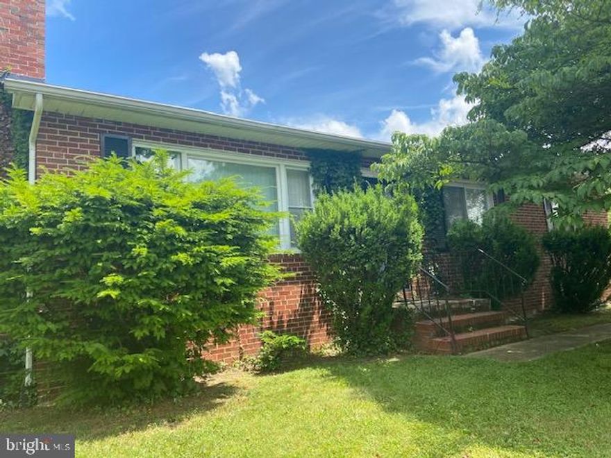 Beautiful brick rancher with full  unfinished basement on quarter of an acre ready for your TLC, updates and handy work.  Create the home of your dreams or  great investment opportunity.  Newer central A/C and stainless steel refrigerator. Hardwood floors throughout with newer windows and storm door.  Enjoy the 6-person full bar in unfinished basement/club-room, ready for your final touches.  Large storage closet in basement. Two separate decks on the exterior and fully-fenced with ample on-street parking.  Great lot, beaming with potential .  Must see!!  As-is  condition